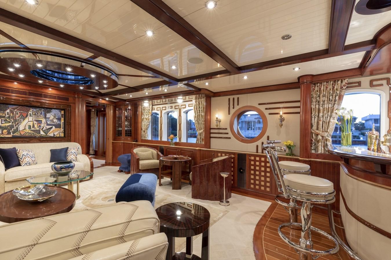 a large living room with a large window aboard NADAN Yacht for Sale