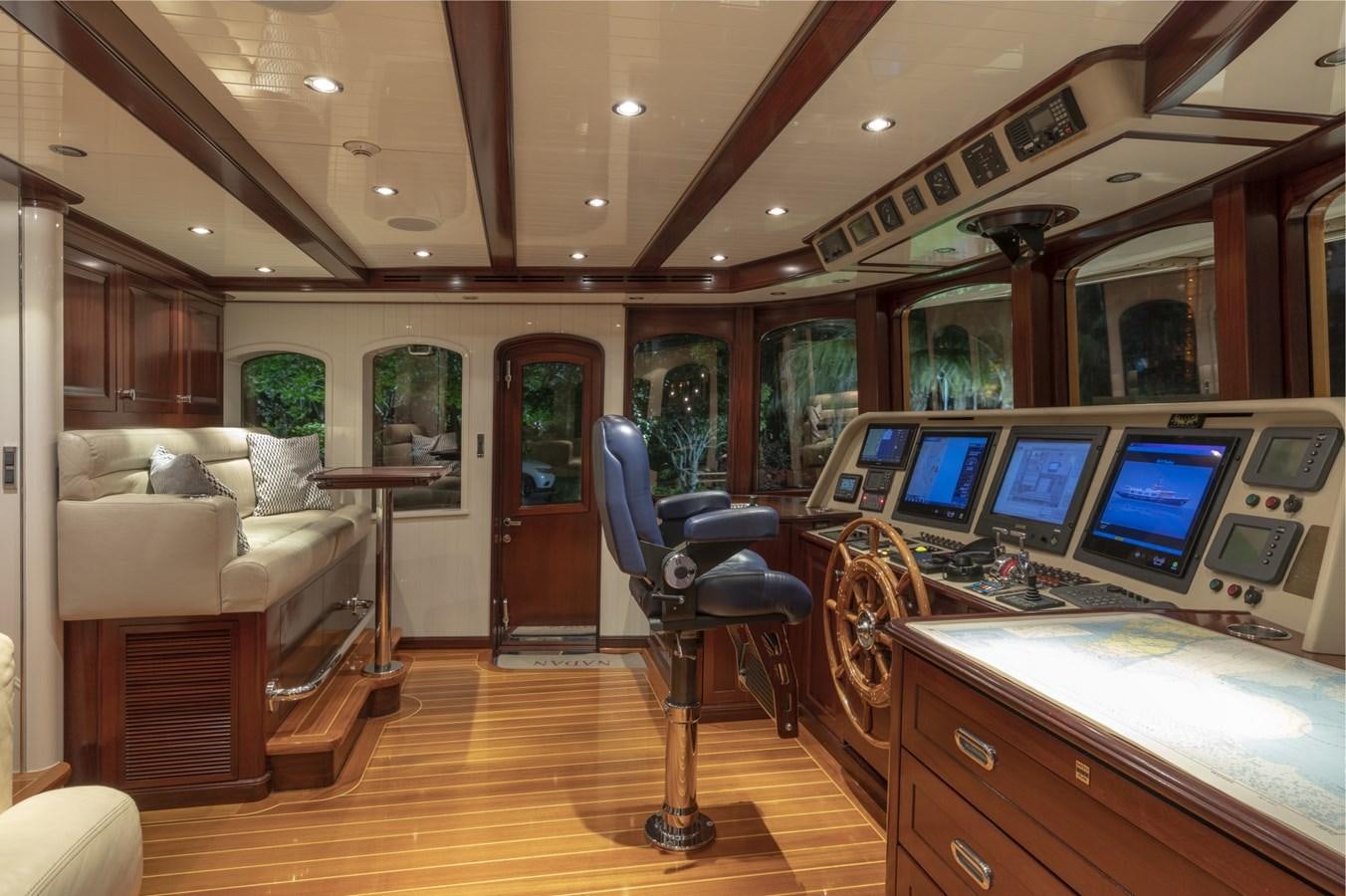 a room with a large mirror and a desk with a computer aboard NADAN Yacht for Sale