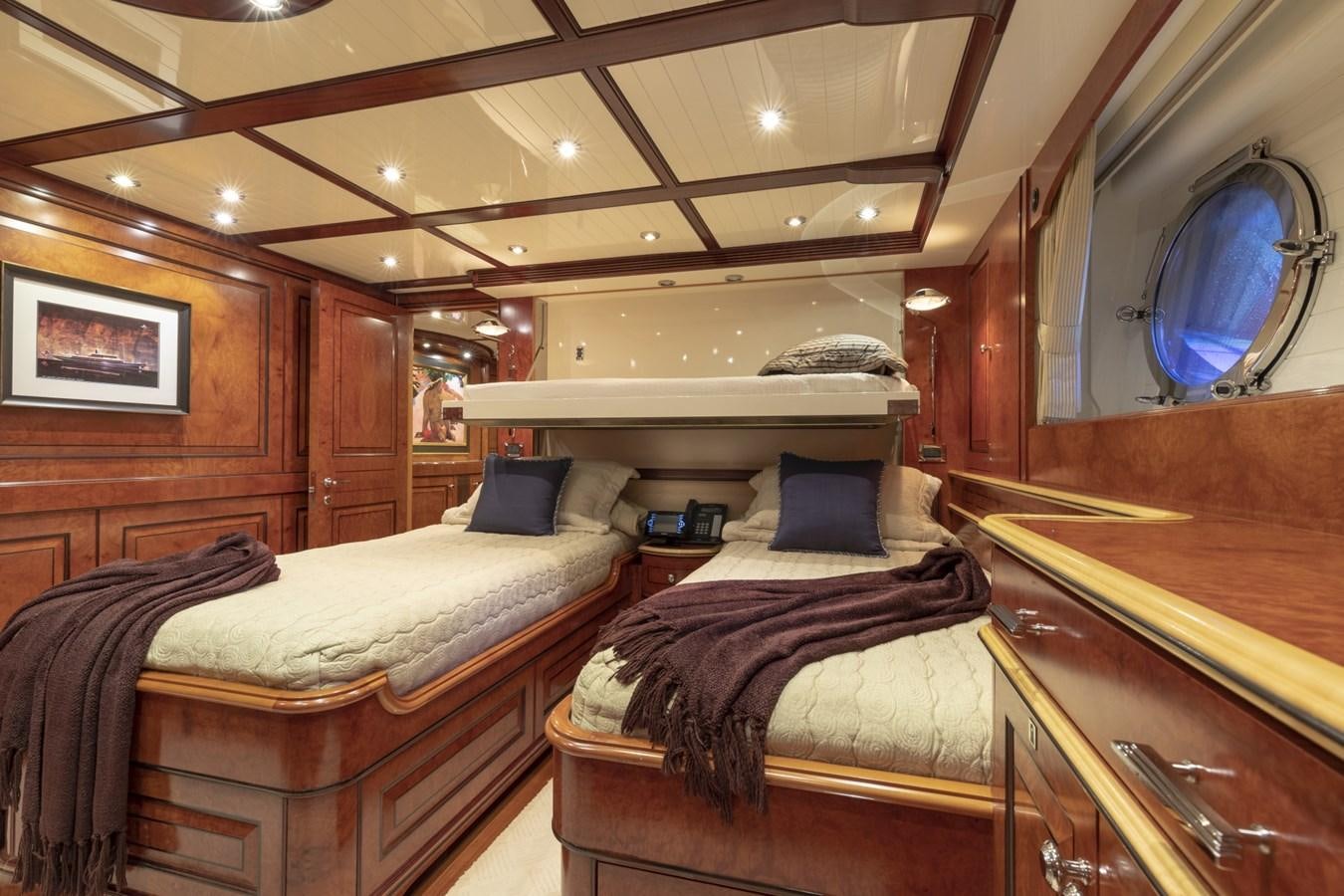 a room with two beds aboard NADAN Yacht for Sale