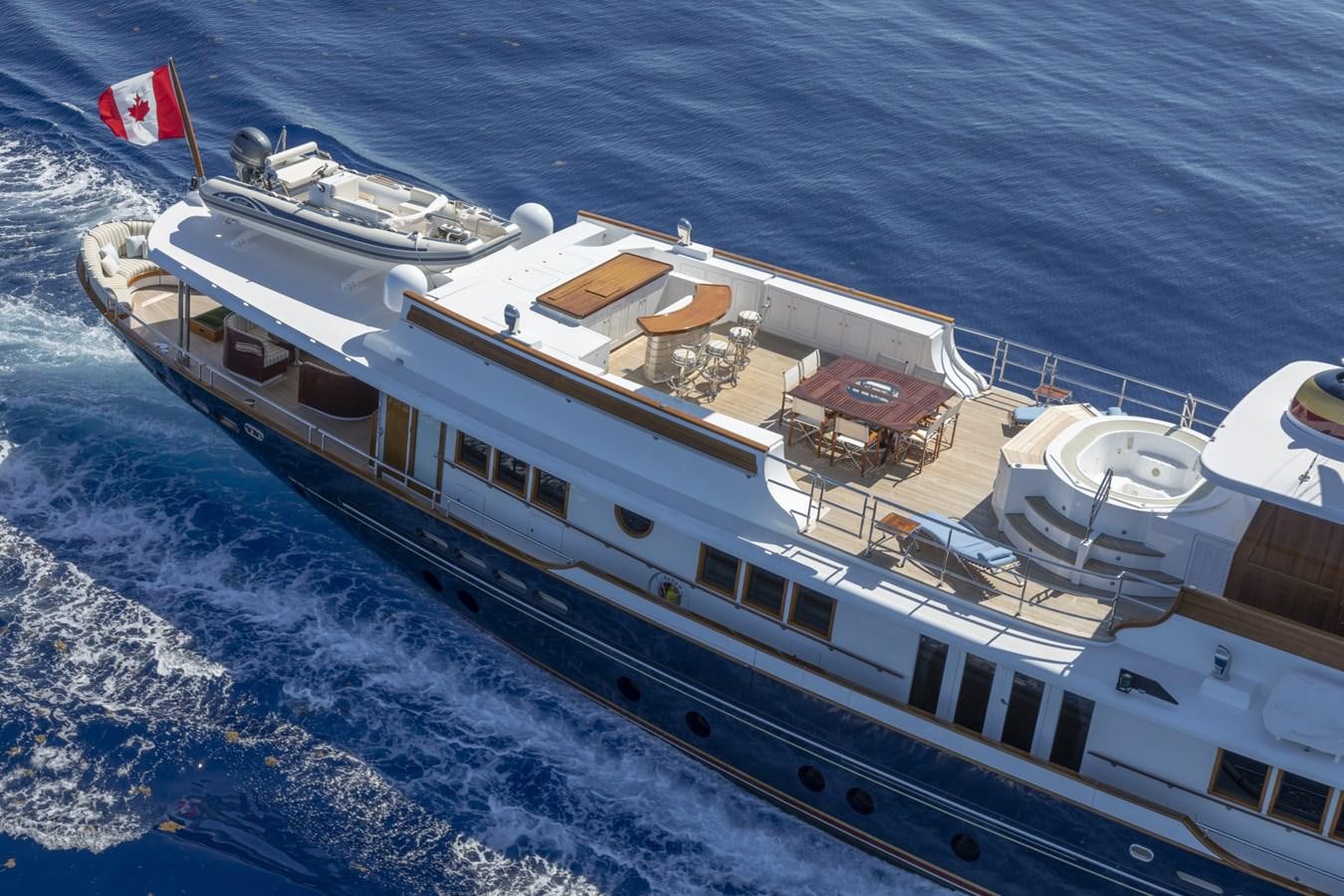 a large ship on the water aboard NADAN Yacht for Sale