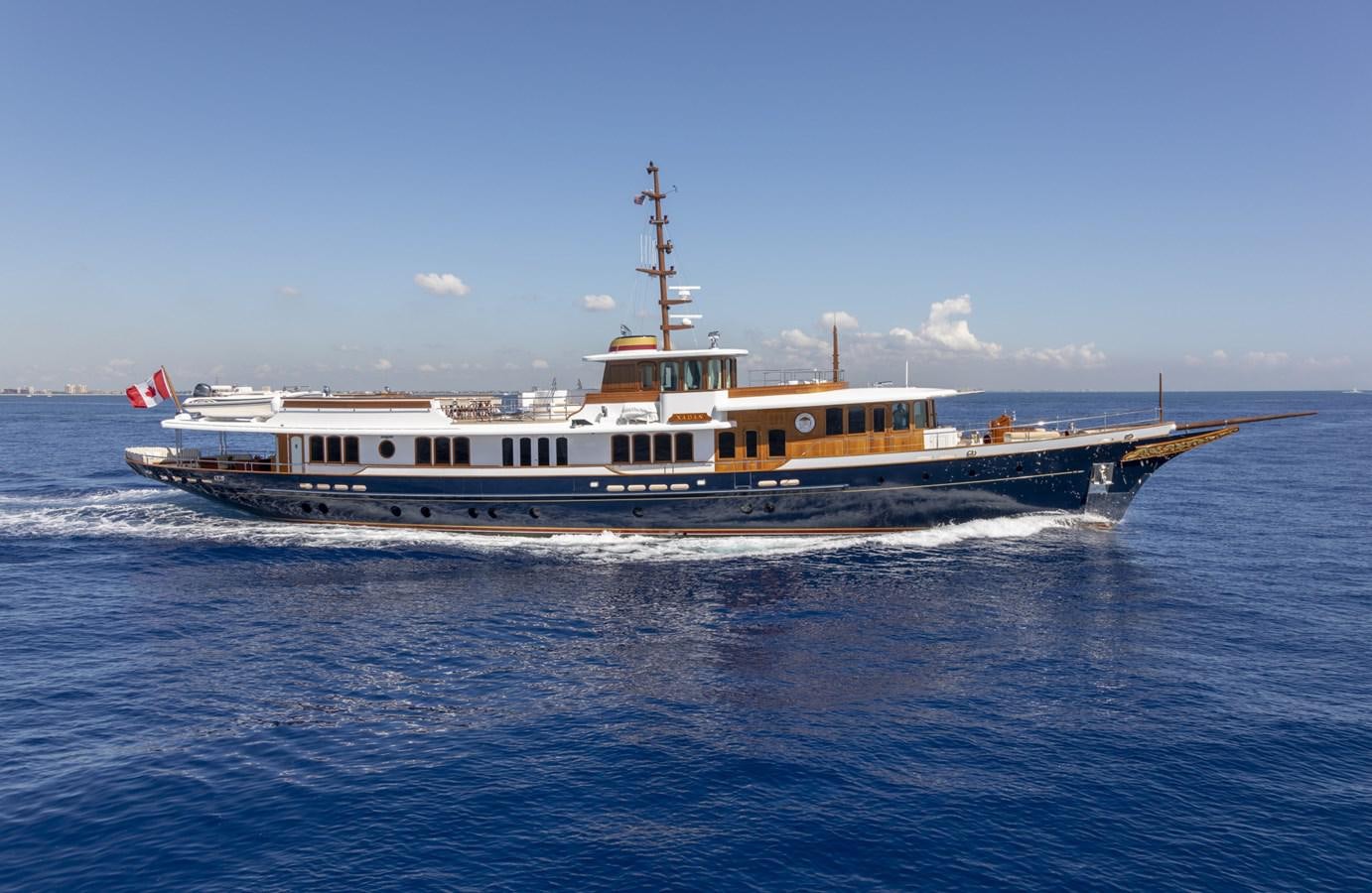 a large ship in the water aboard NADAN Yacht for Sale