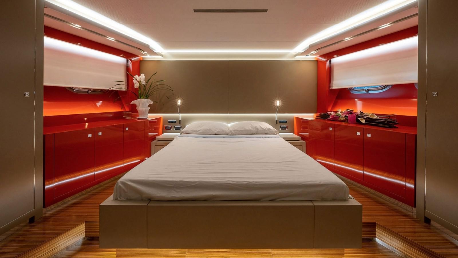 a bed in a room aboard MAXI DRAGO Yacht for Sale
