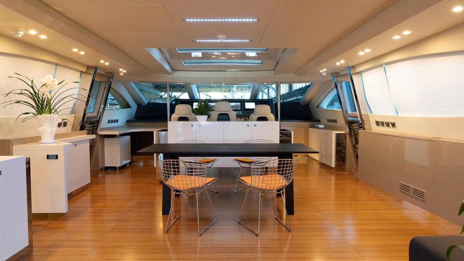 an office with a large open floor aboard MAXI DRAGO Yacht for Sale