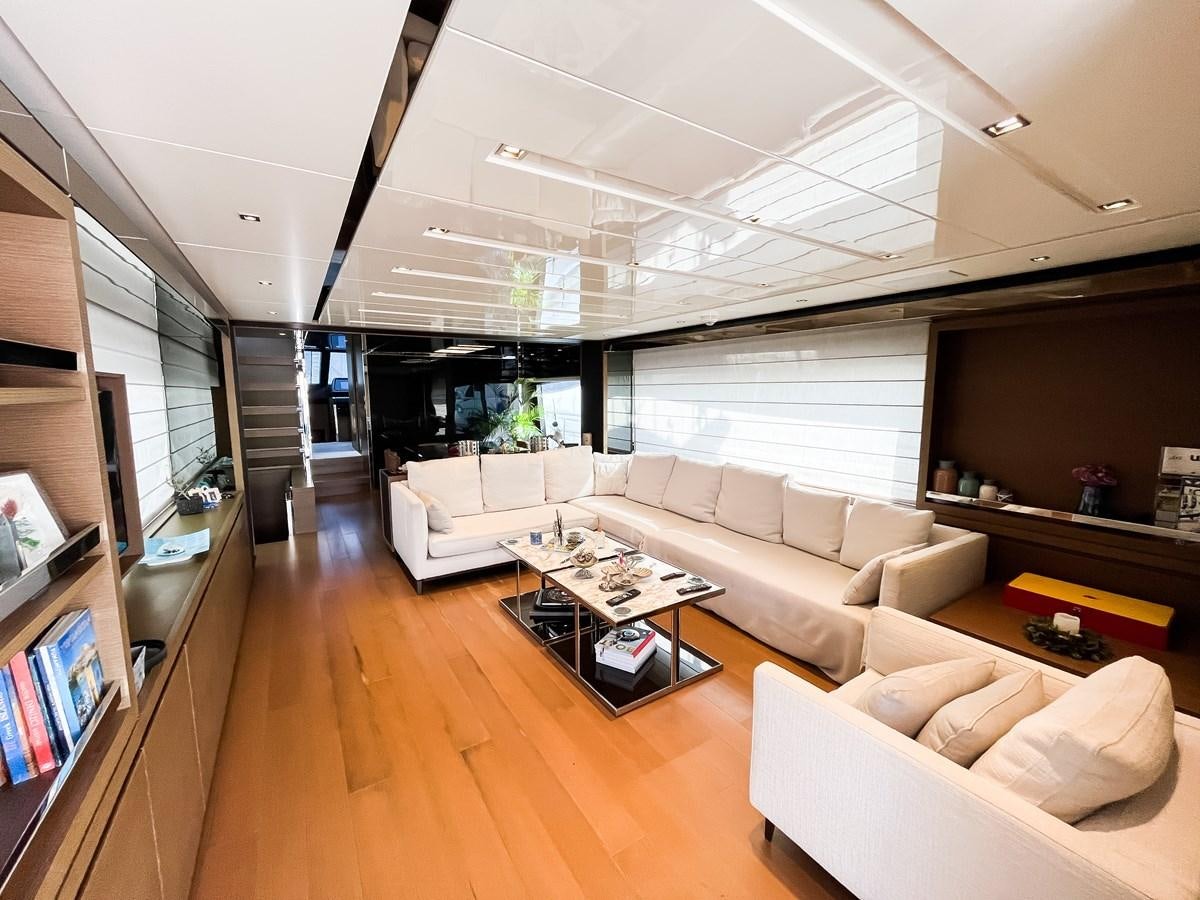 a living room with a large window aboard SANLORENZO SX88/01 Yacht for Sale