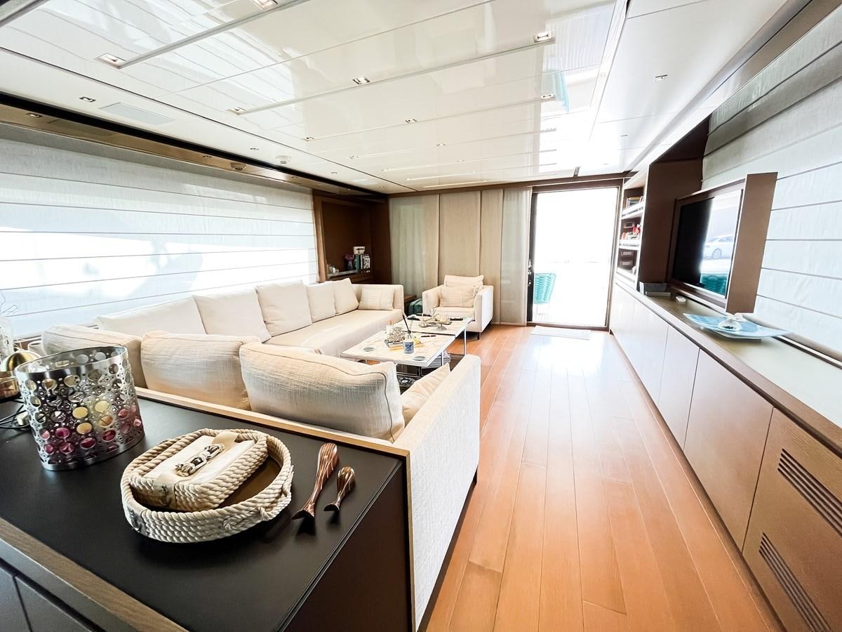 a living room with a large window aboard SANLORENZO SX88/01 Yacht for Sale