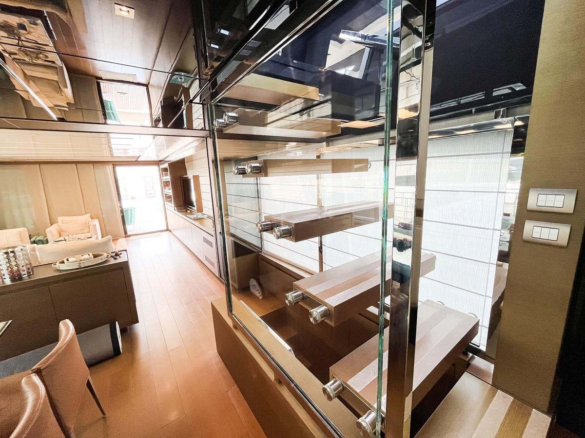 a room with a glass wall aboard SANLORENZO SX88/01 Yacht for Sale