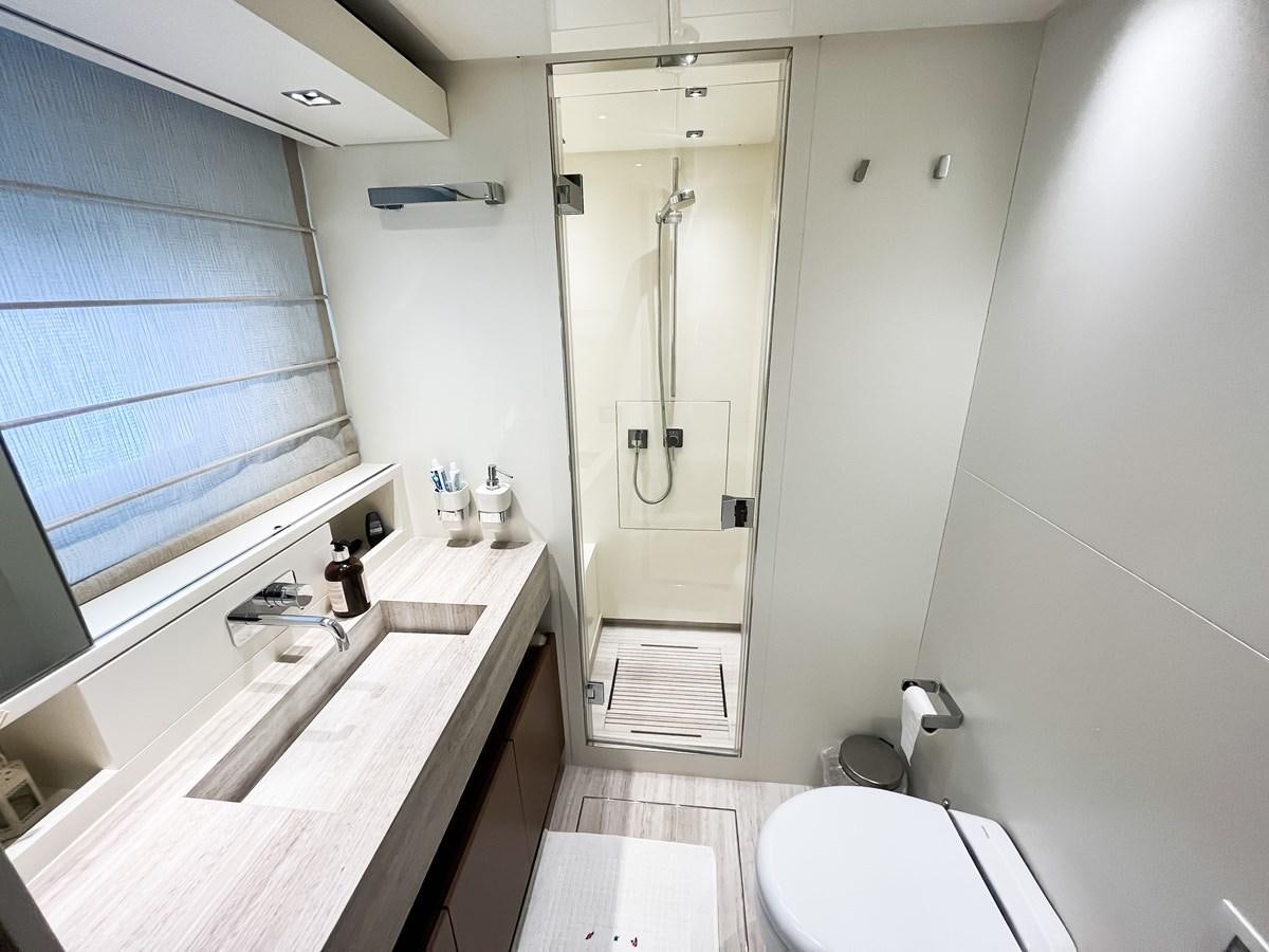 a bathroom with a shower and sink aboard SANLORENZO SX88/01 Yacht for Sale