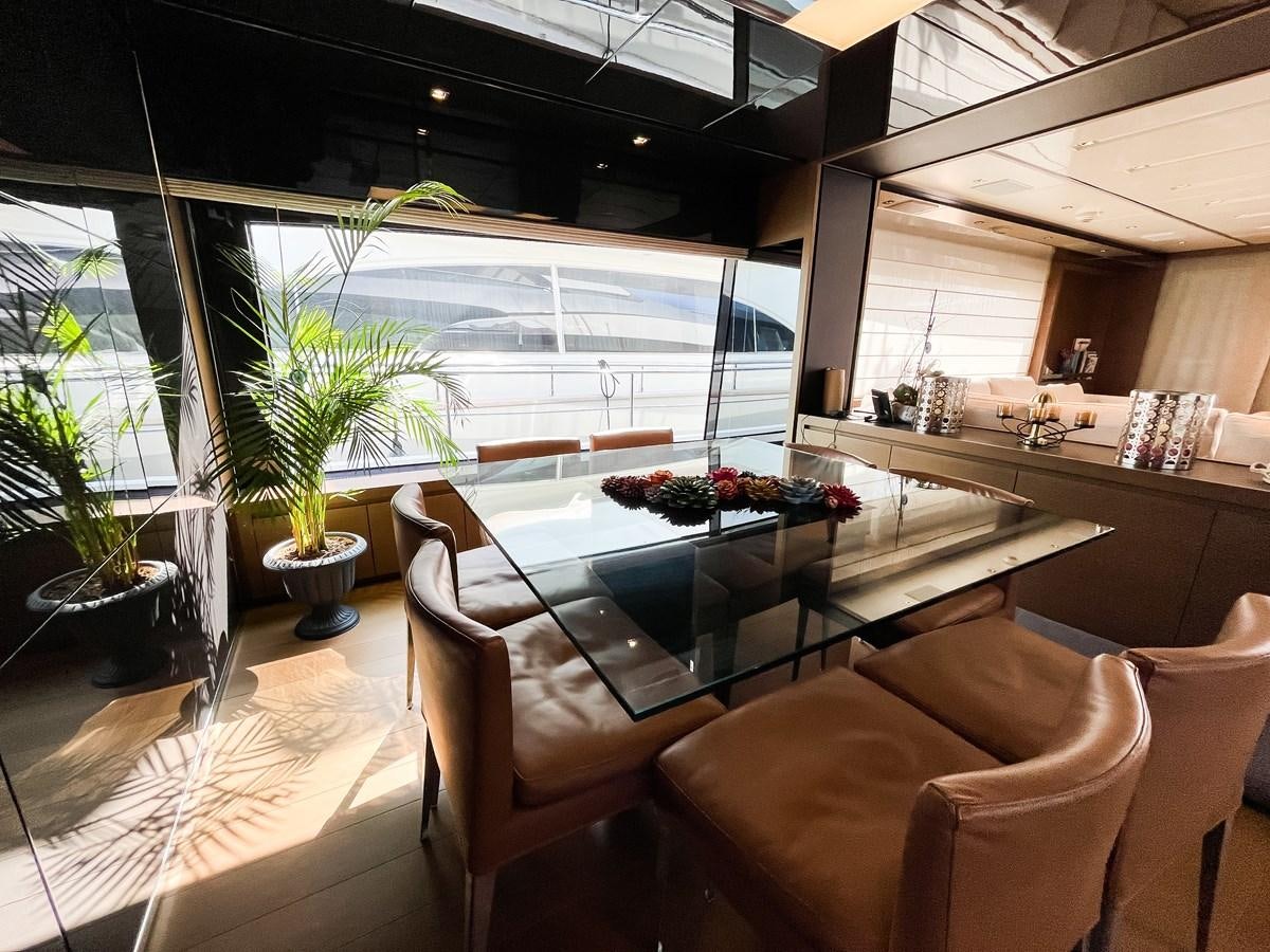 a living room with a large window aboard SANLORENZO SX88/01 Yacht for Sale