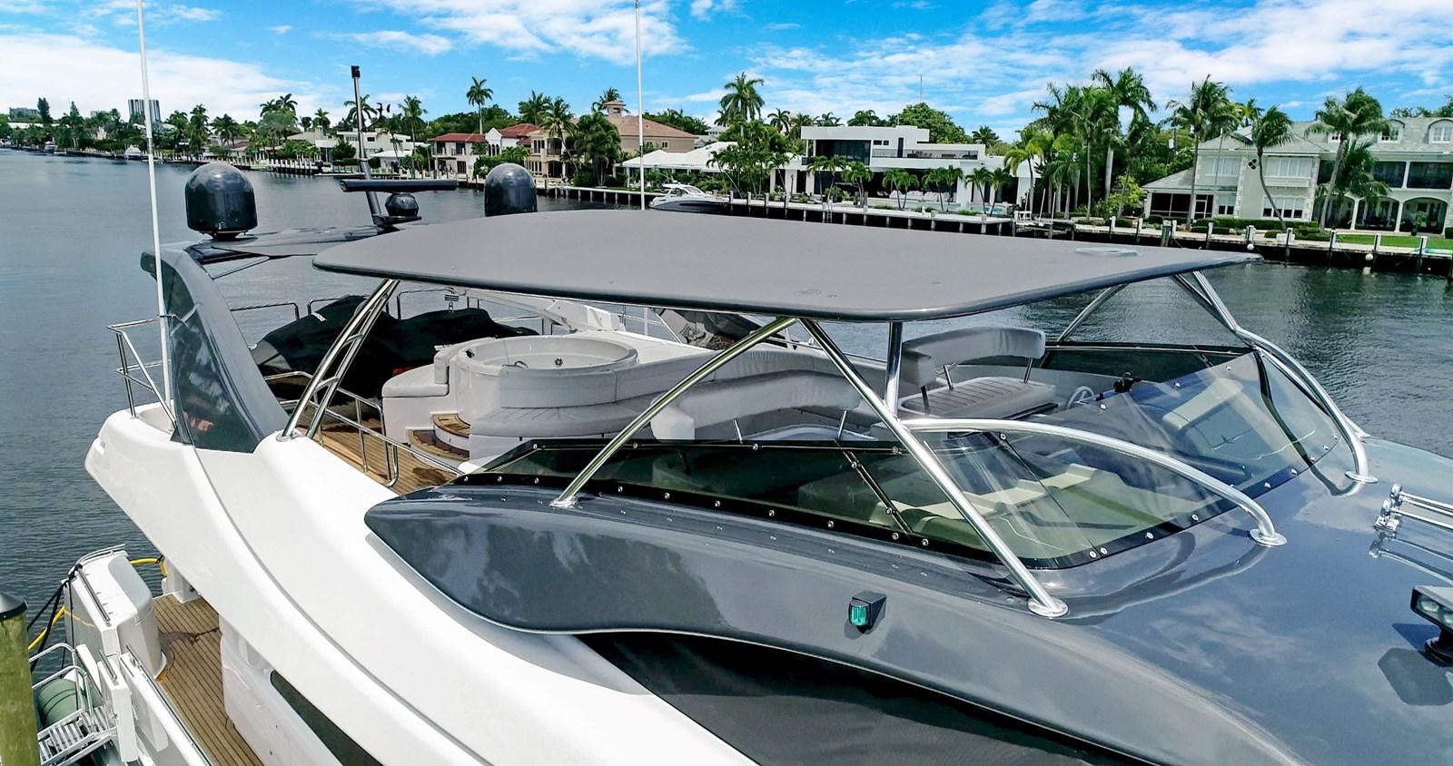 a boat parked in a harbor aboard SINPATICO Yacht for Sale