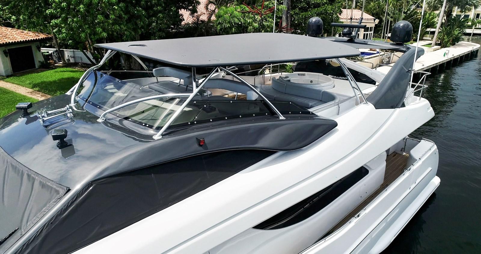 a white car parked on a dock aboard SINPATICO Yacht for Sale