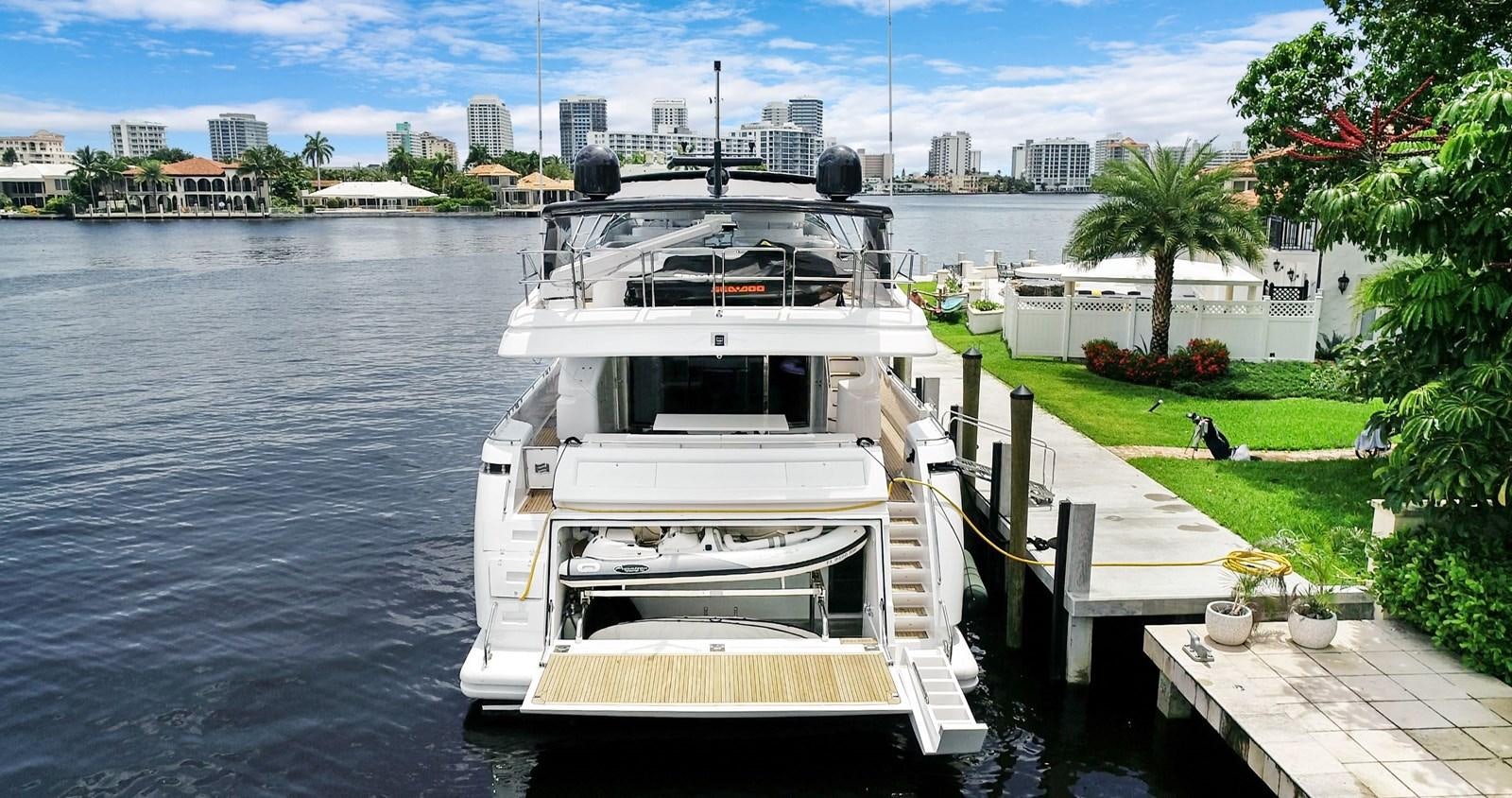 a boat docked at a pier aboard SINPATICO Yacht for Sale