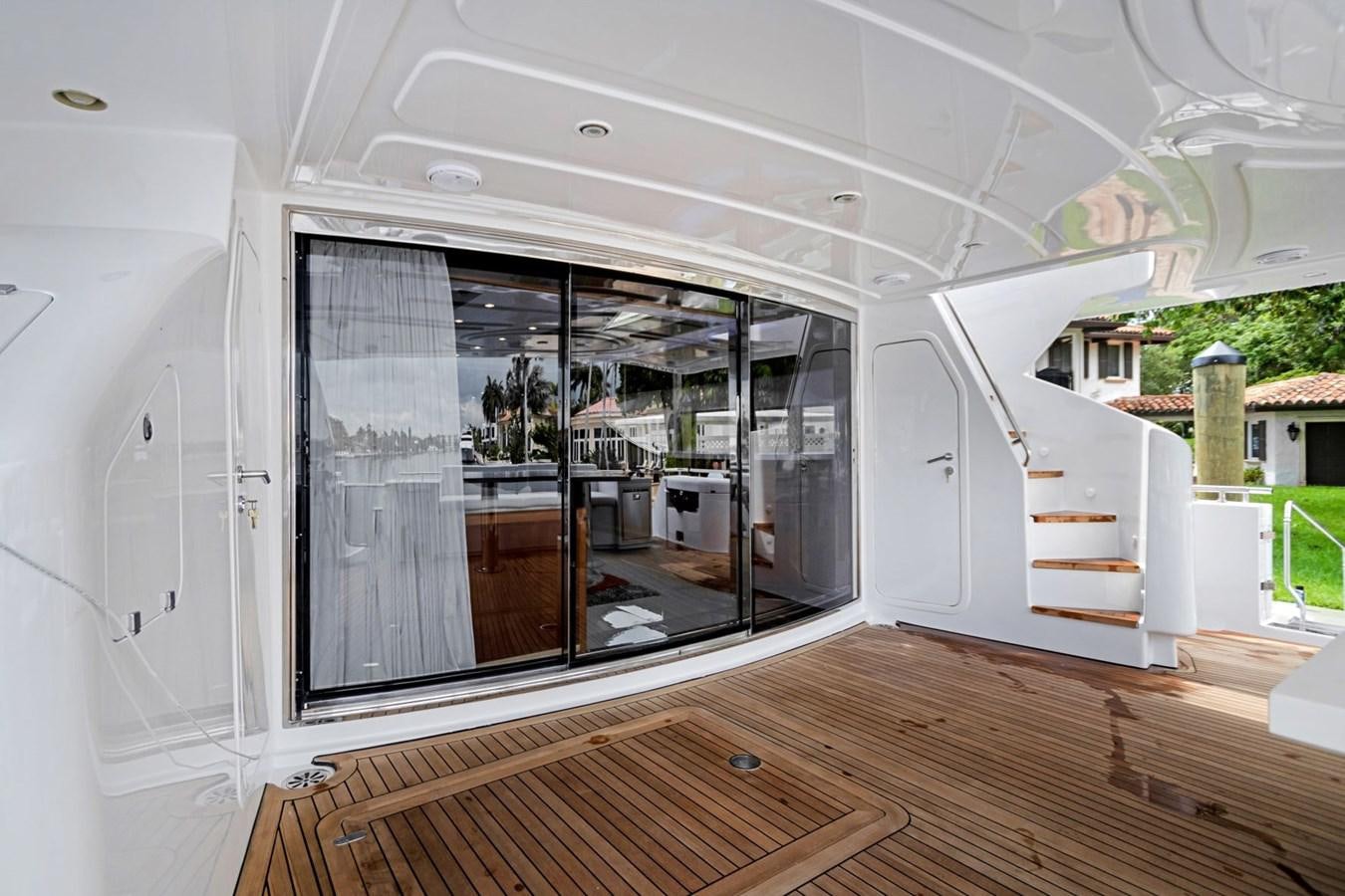 a glass door on a white house aboard SINPATICO Yacht for Sale