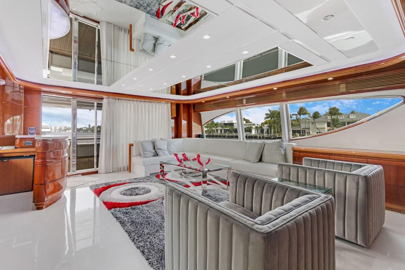 a room with a couch and a table aboard SINPATICO Yacht for Sale