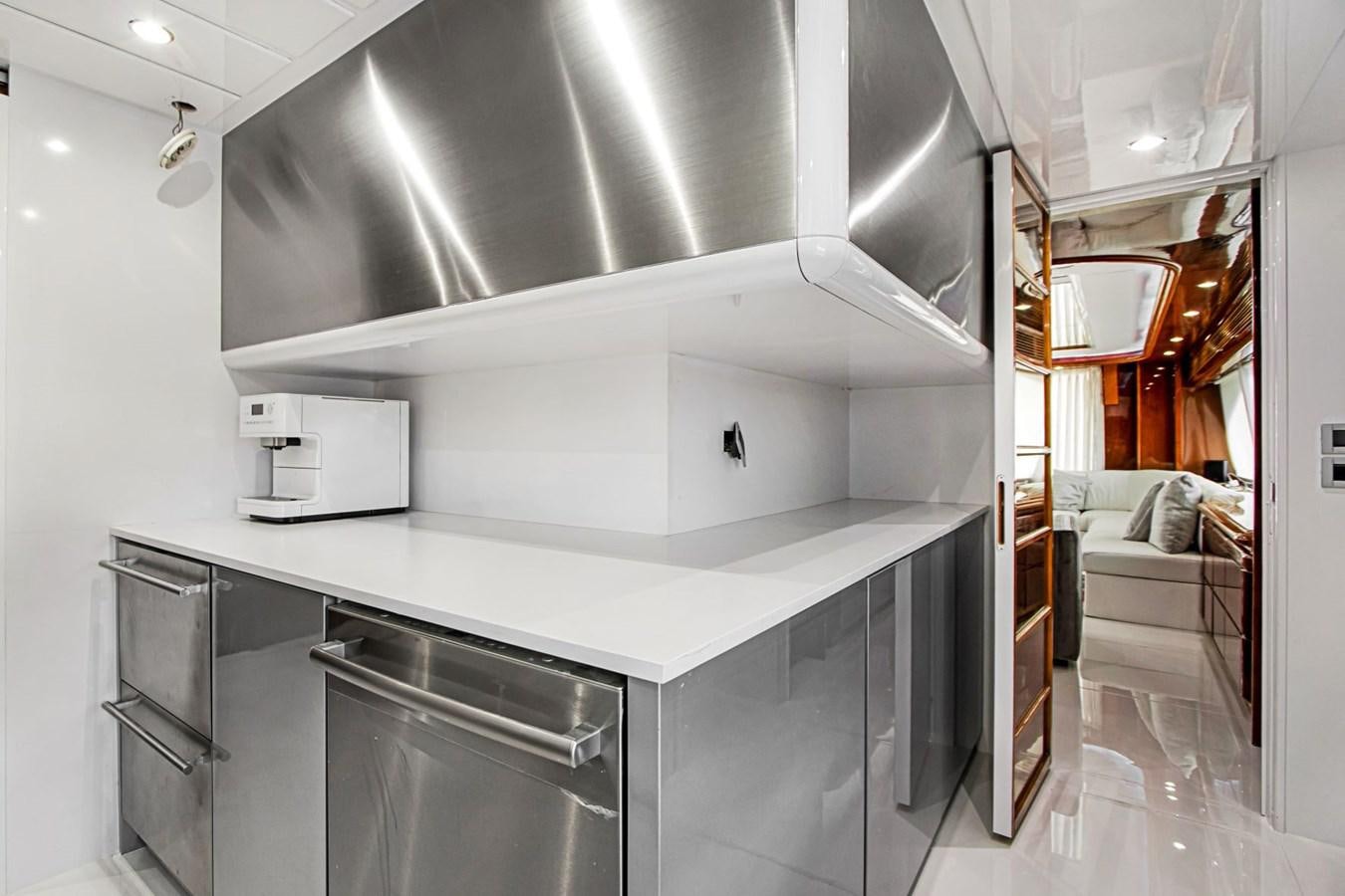 a kitchen with a stainless steel sink aboard SINPATICO Yacht for Sale