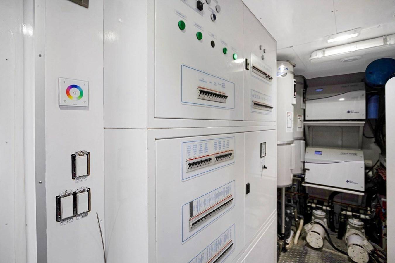 a white machine with green lights aboard SINPATICO Yacht for Sale