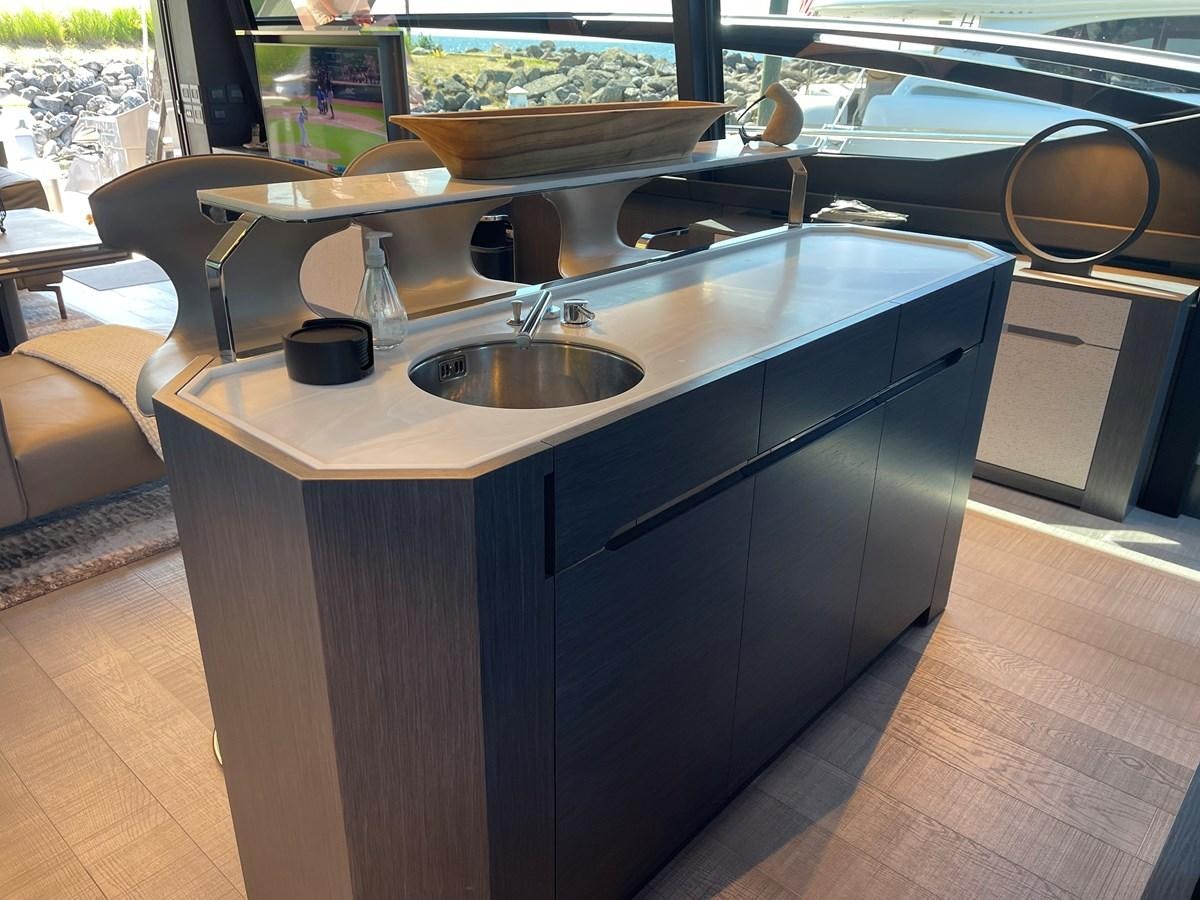 a kitchen island with a sink aboard NICKY D Yacht for Sale