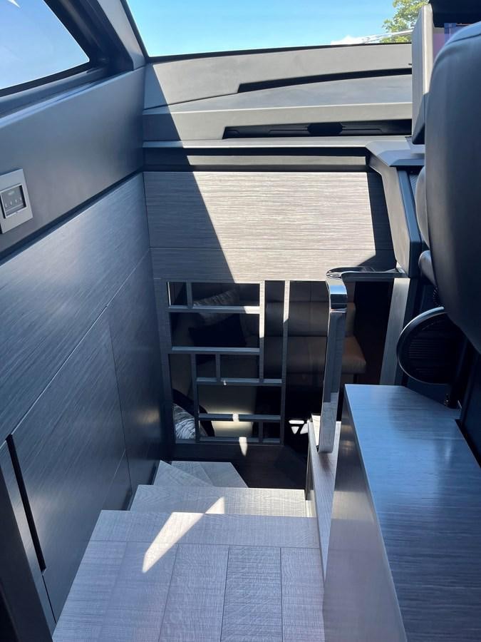 a black and white striped staircase aboard NICKY D Yacht for Sale