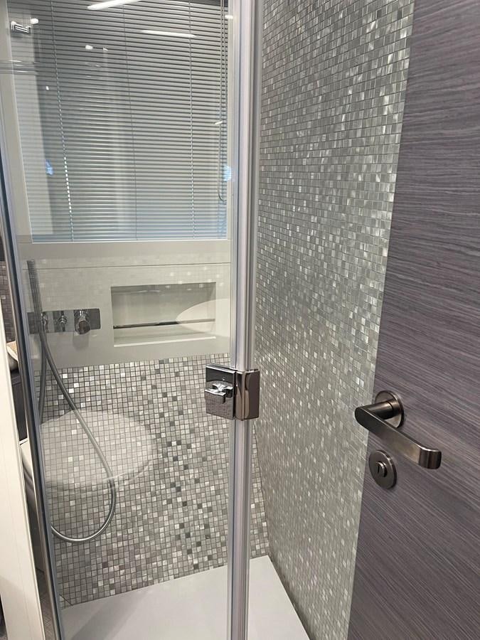 a shower unit in a bathroom aboard NICKY D Yacht for Sale