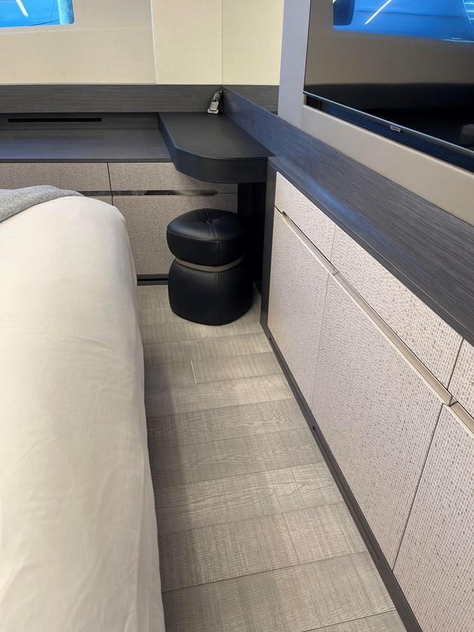 a bathroom with a countertop sink and a black trash can aboard NICKY D Yacht for Sale