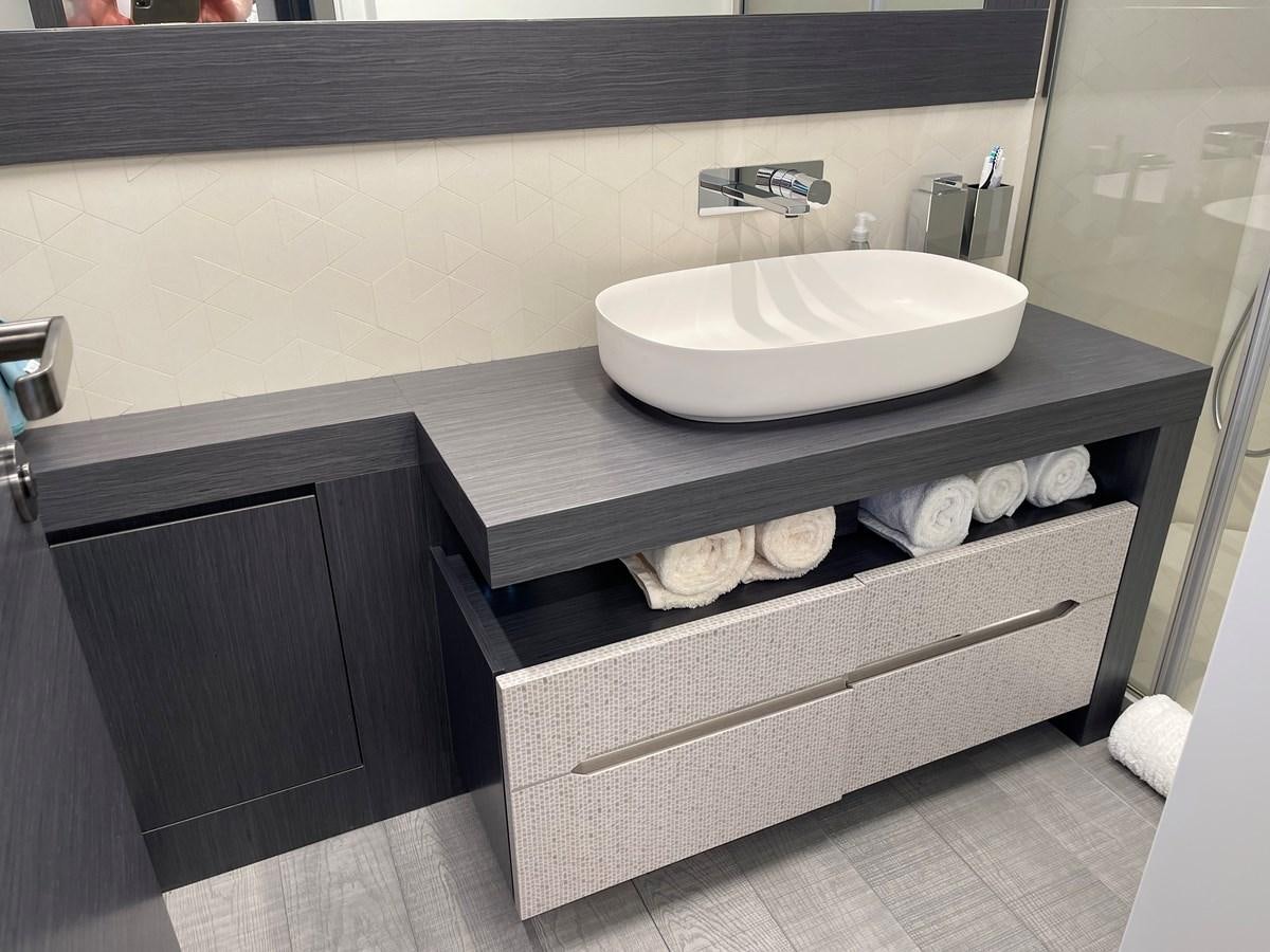 a bathroom sink with a countertop aboard NICKY D Yacht for Sale