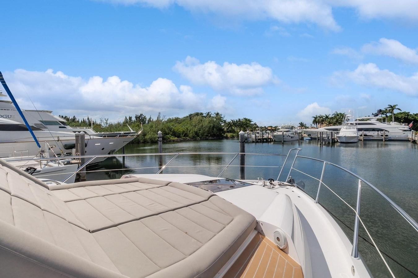 a boat docked at a pier aboard JOLLY ROGERS Yacht for Sale