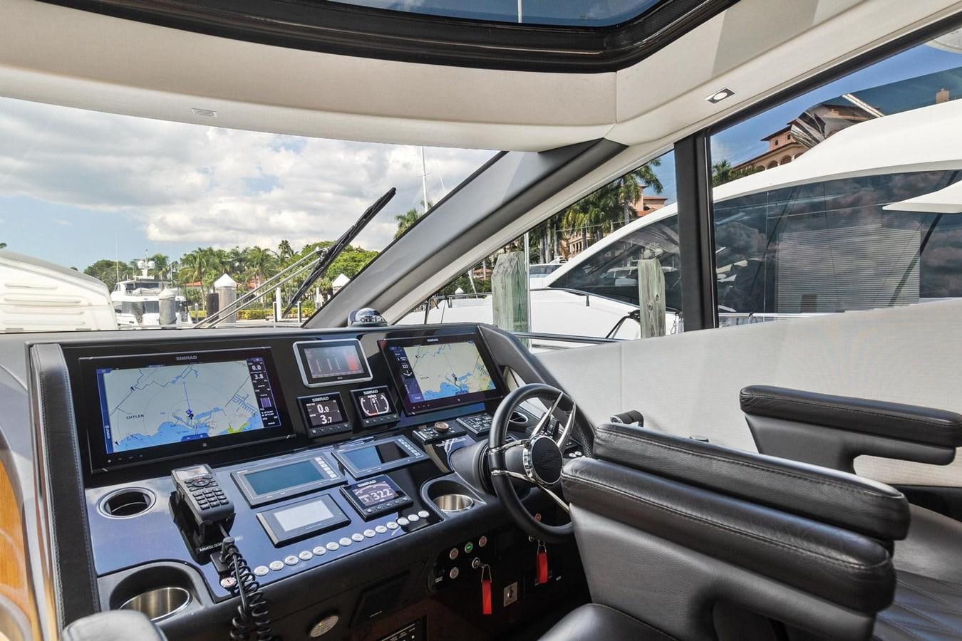 inside of a car aboard JOLLY ROGERS Yacht for Sale