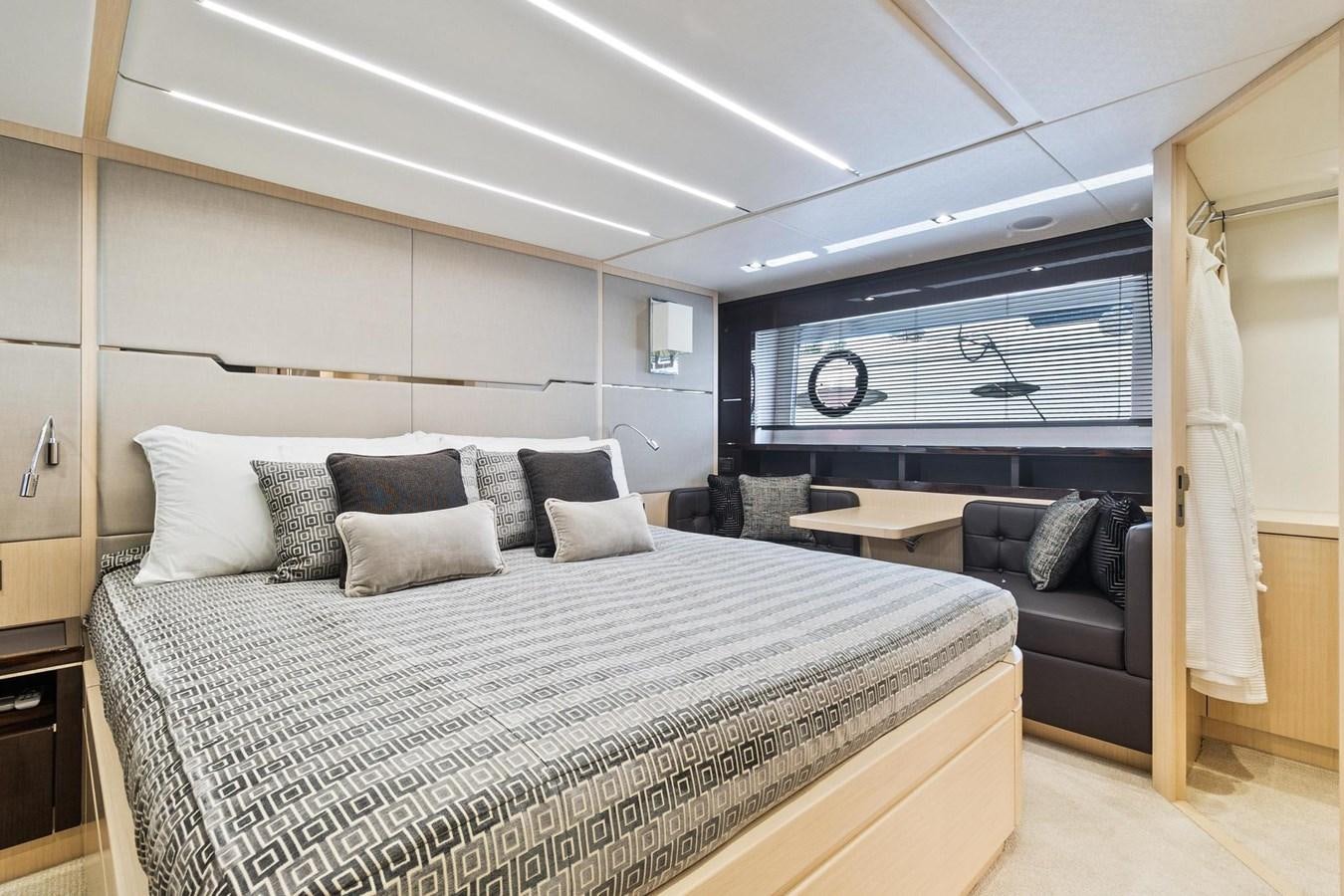 a bed in a room aboard JOLLY ROGERS Yacht for Sale