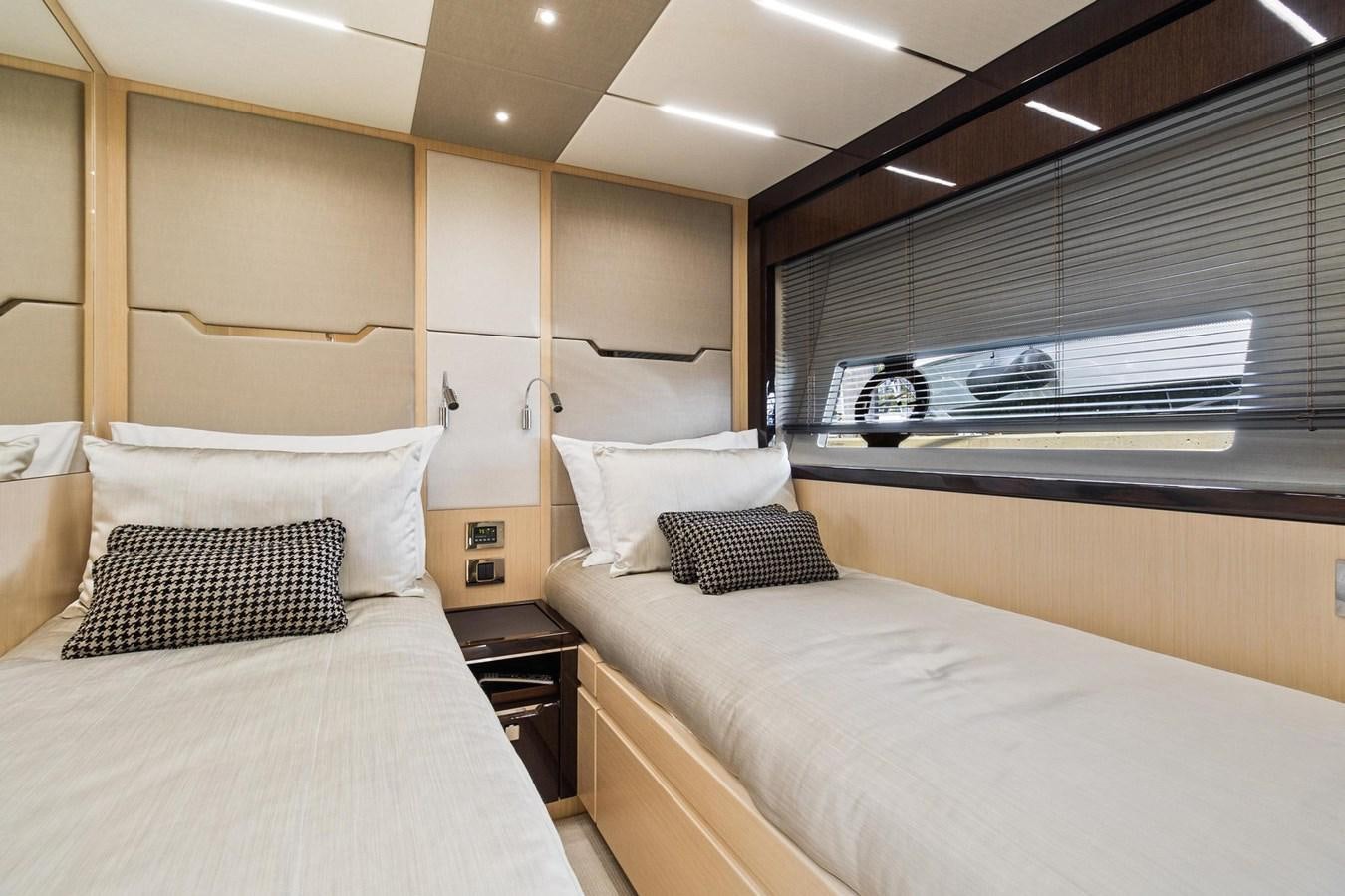 a room with two beds aboard JOLLY ROGERS Yacht for Sale