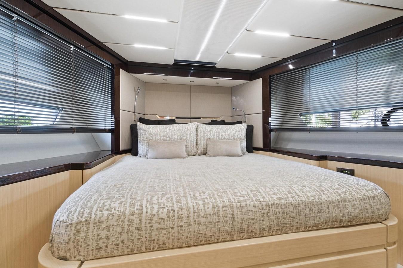 a large bed in a room aboard JOLLY ROGERS Yacht for Sale