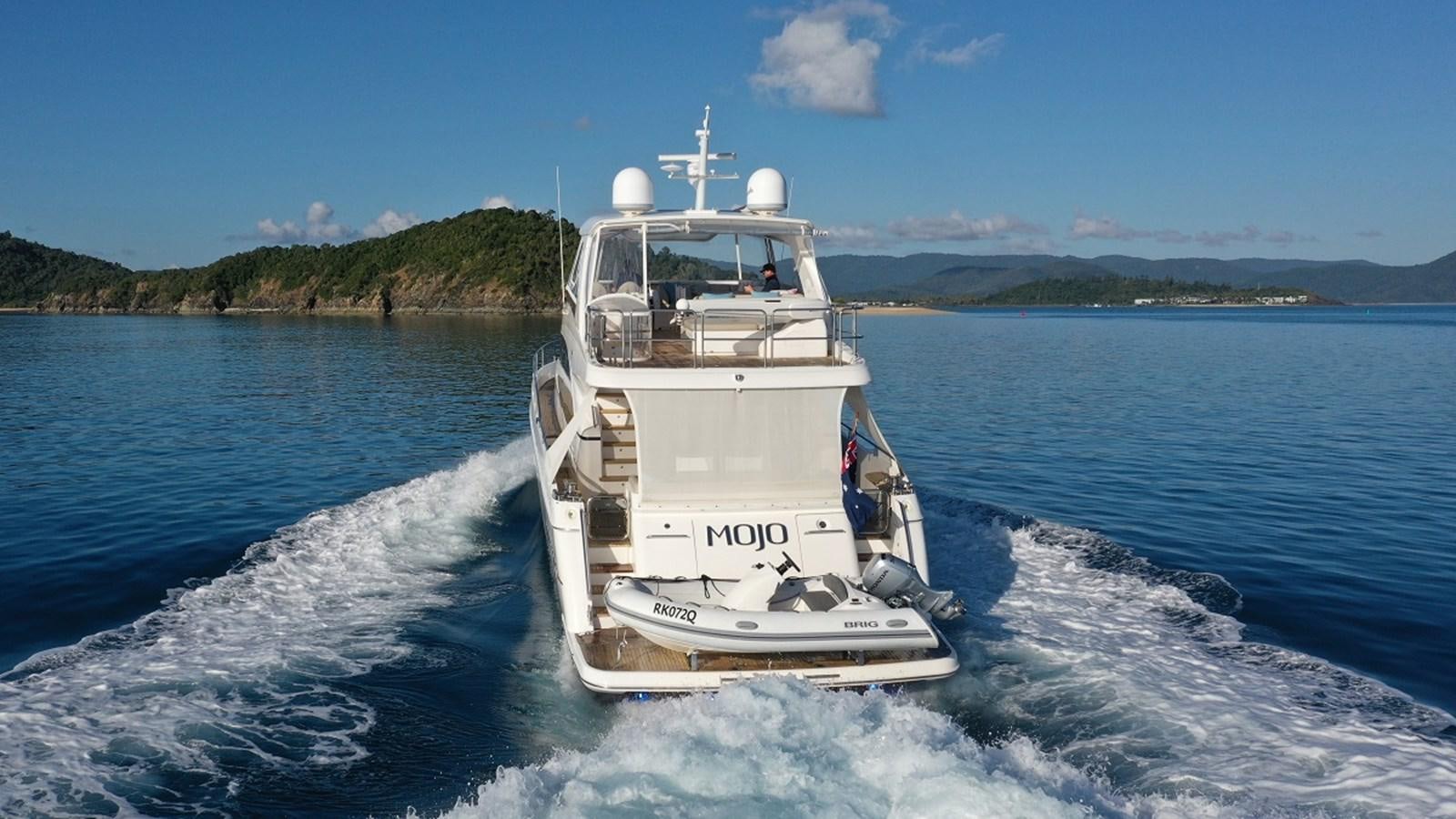 a boat on the water aboard MOJO Yacht for Sale