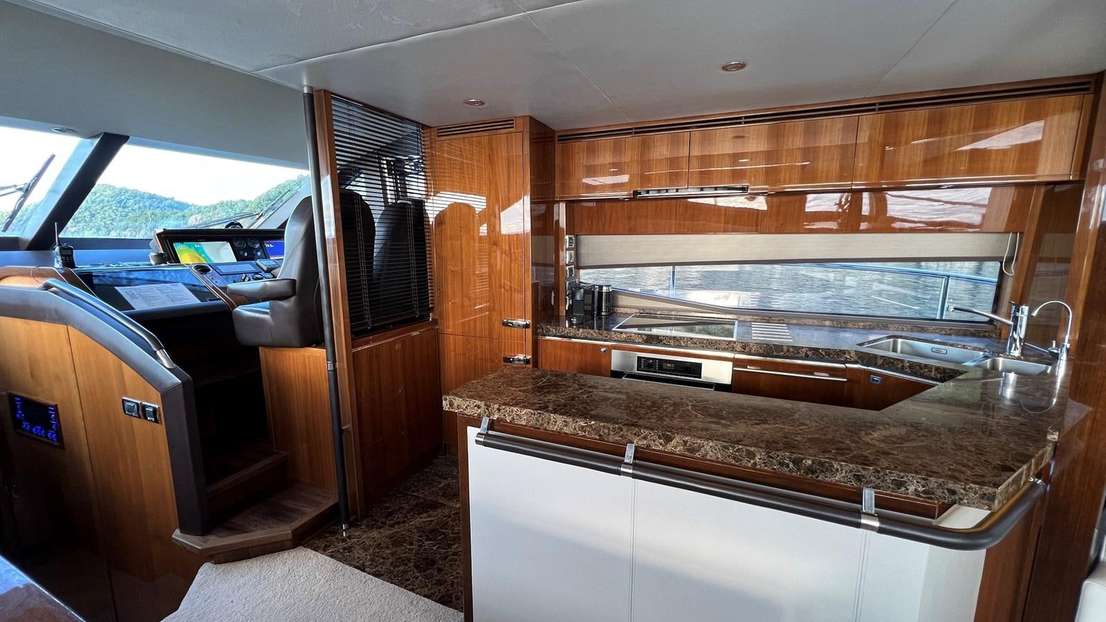 a kitchen with a large oven aboard MOJO Yacht for Sale