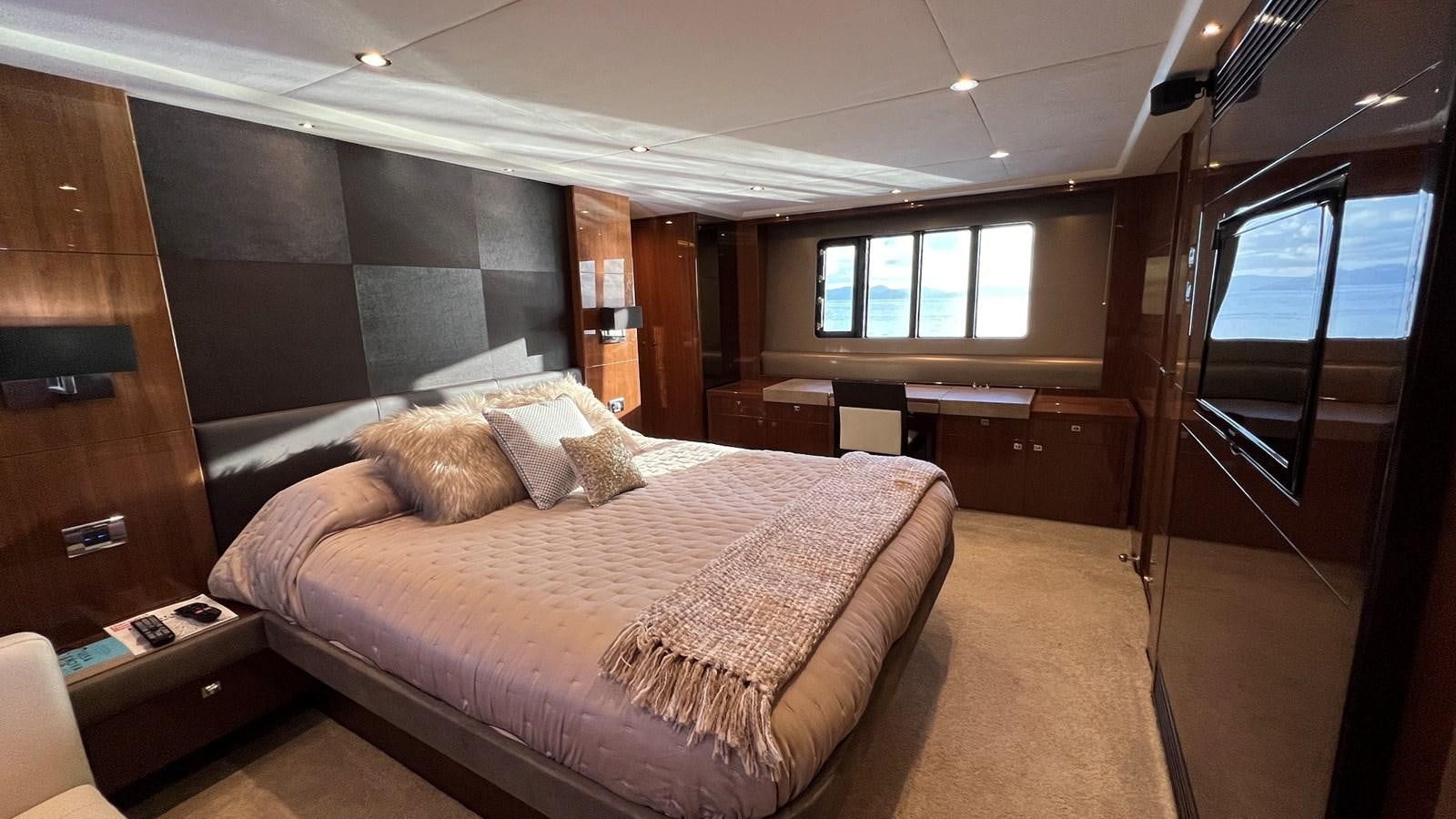 a bed in a room aboard MOJO Yacht for Sale