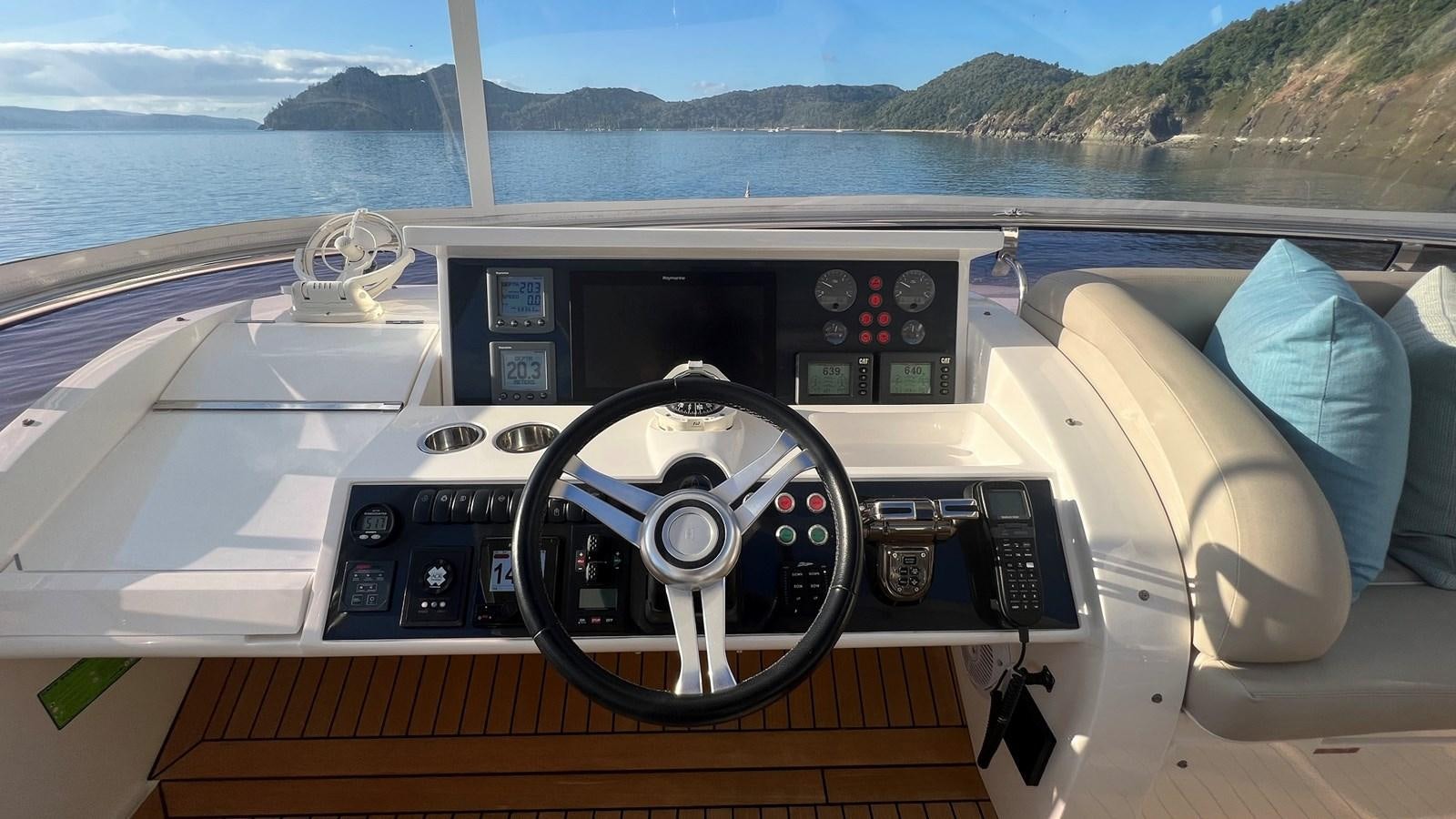 the inside of a cockpit of a plane aboard MOJO Yacht for Sale