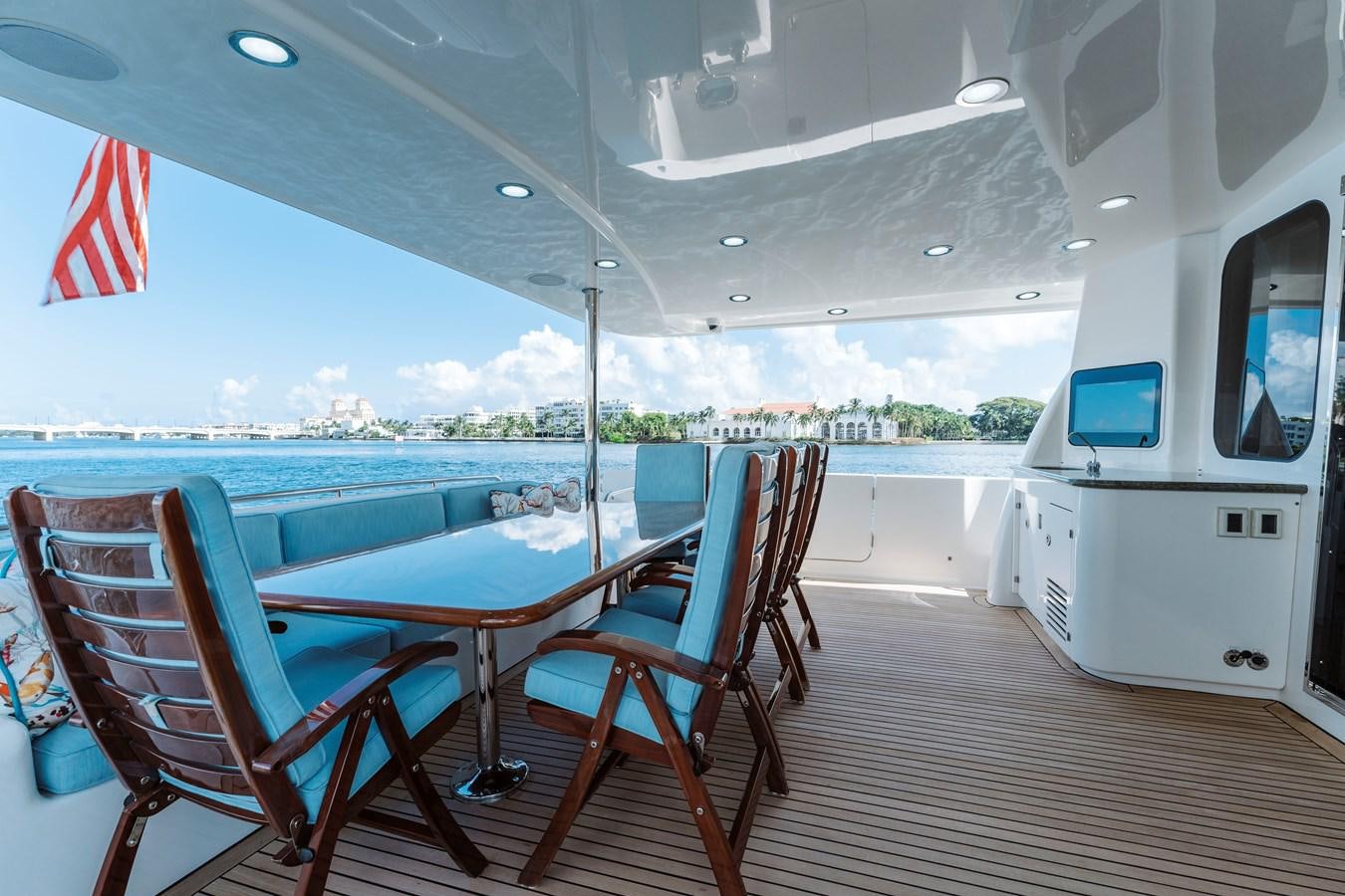 a boat on a deck aboard FULLY OCCUPIED Yacht for Sale