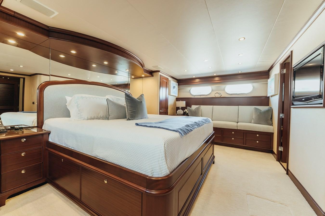 a large bedroom with a bed aboard FULLY OCCUPIED Yacht for Sale