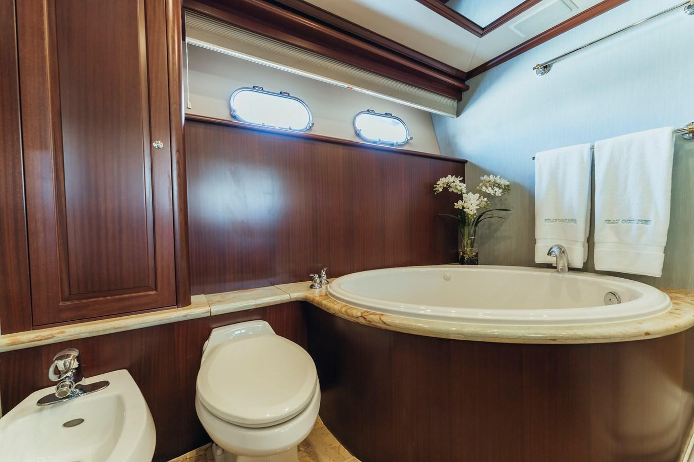 a bathroom with a sink and toilet aboard FULLY OCCUPIED Yacht for Sale