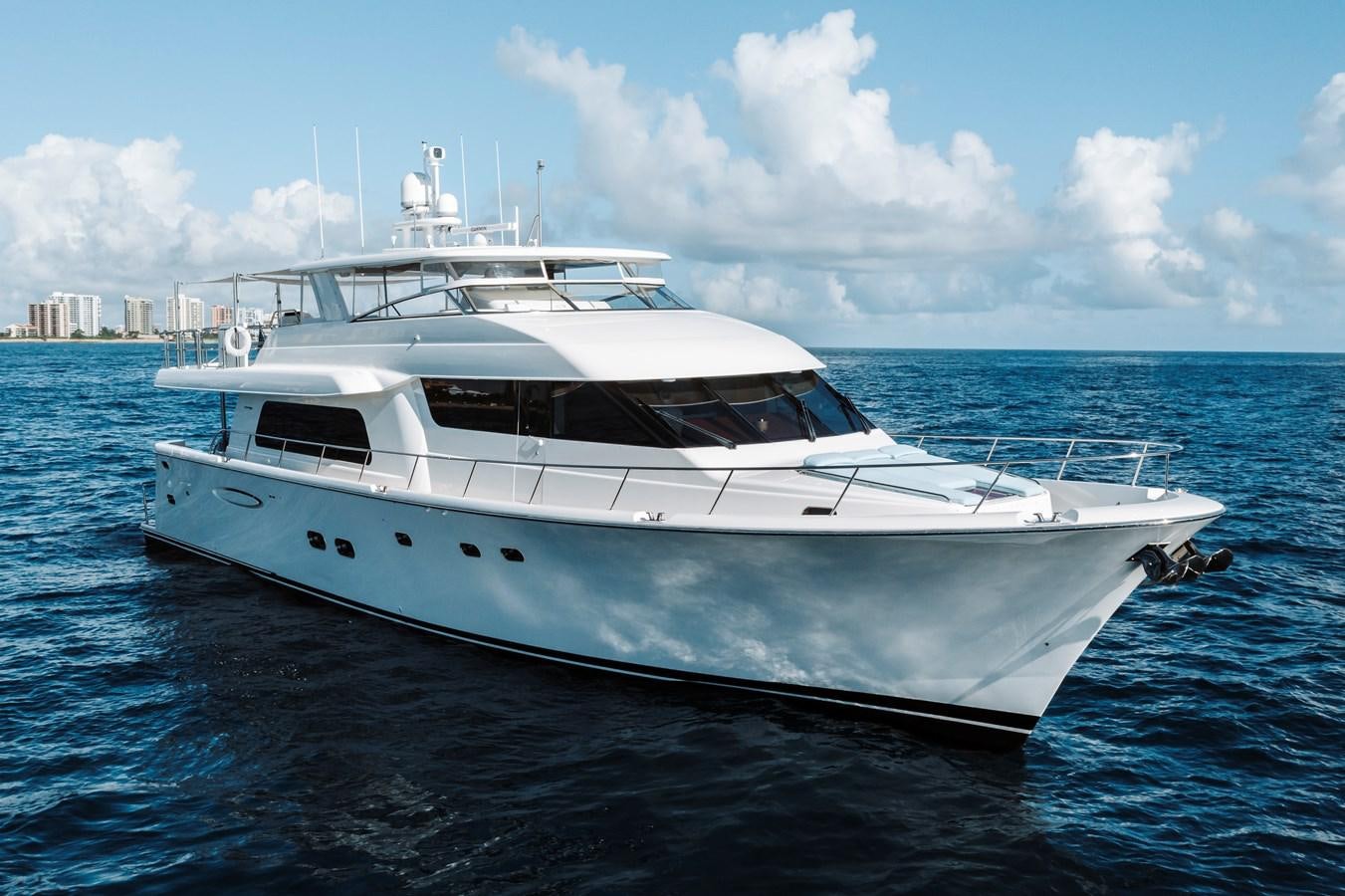 a white yacht in the water aboard FULLY OCCUPIED Yacht for Sale