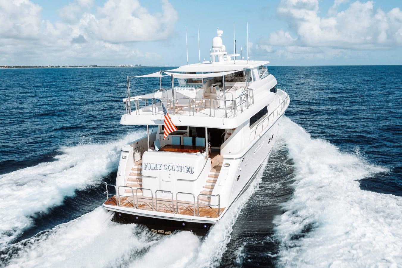 a boat on the water aboard FULLY OCCUPIED Yacht for Sale