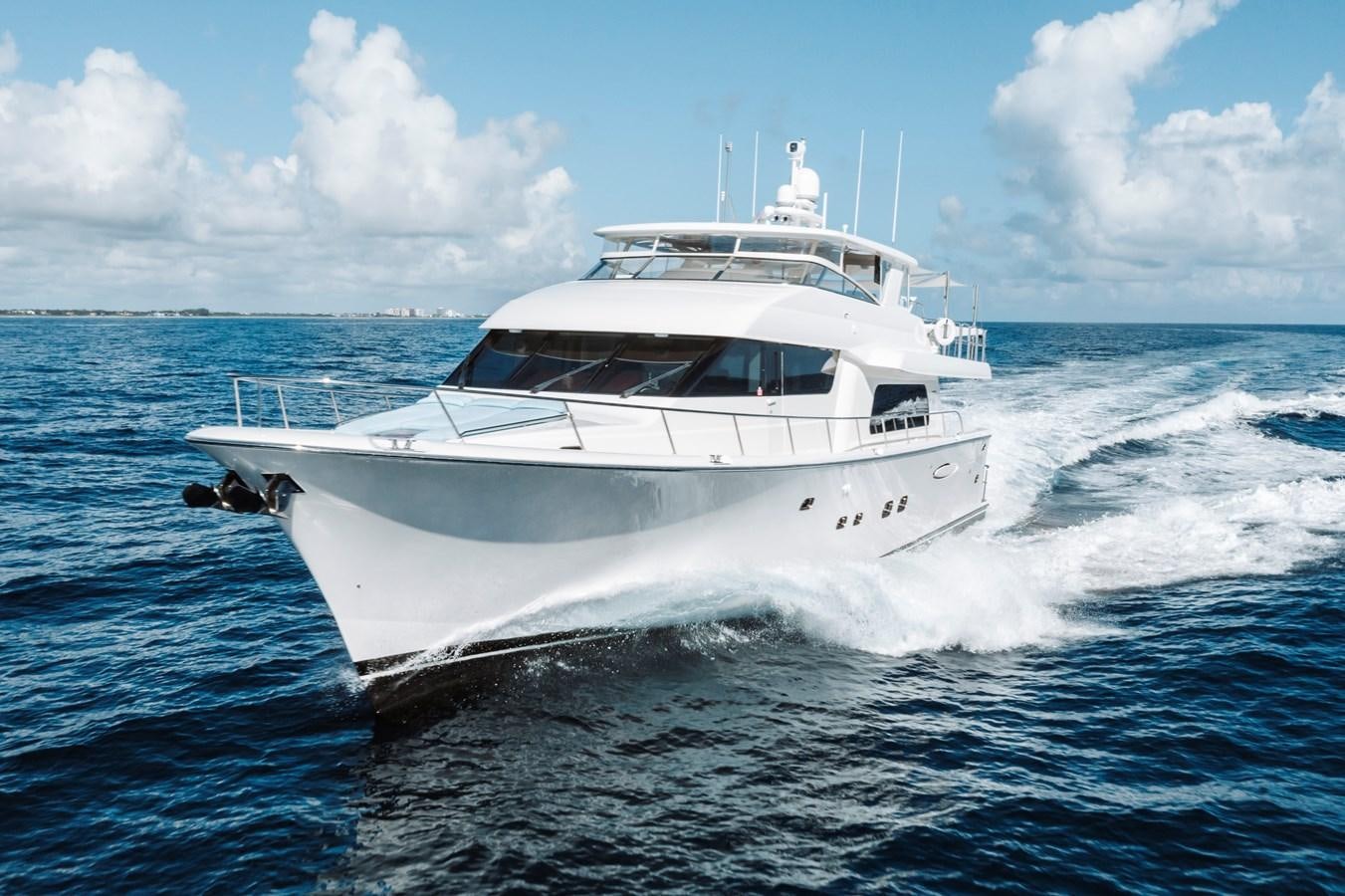 a white yacht in the water aboard FULLY OCCUPIED Yacht for Sale