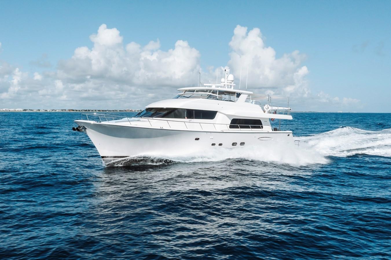 a white yacht in the water aboard FULLY OCCUPIED Yacht for Sale