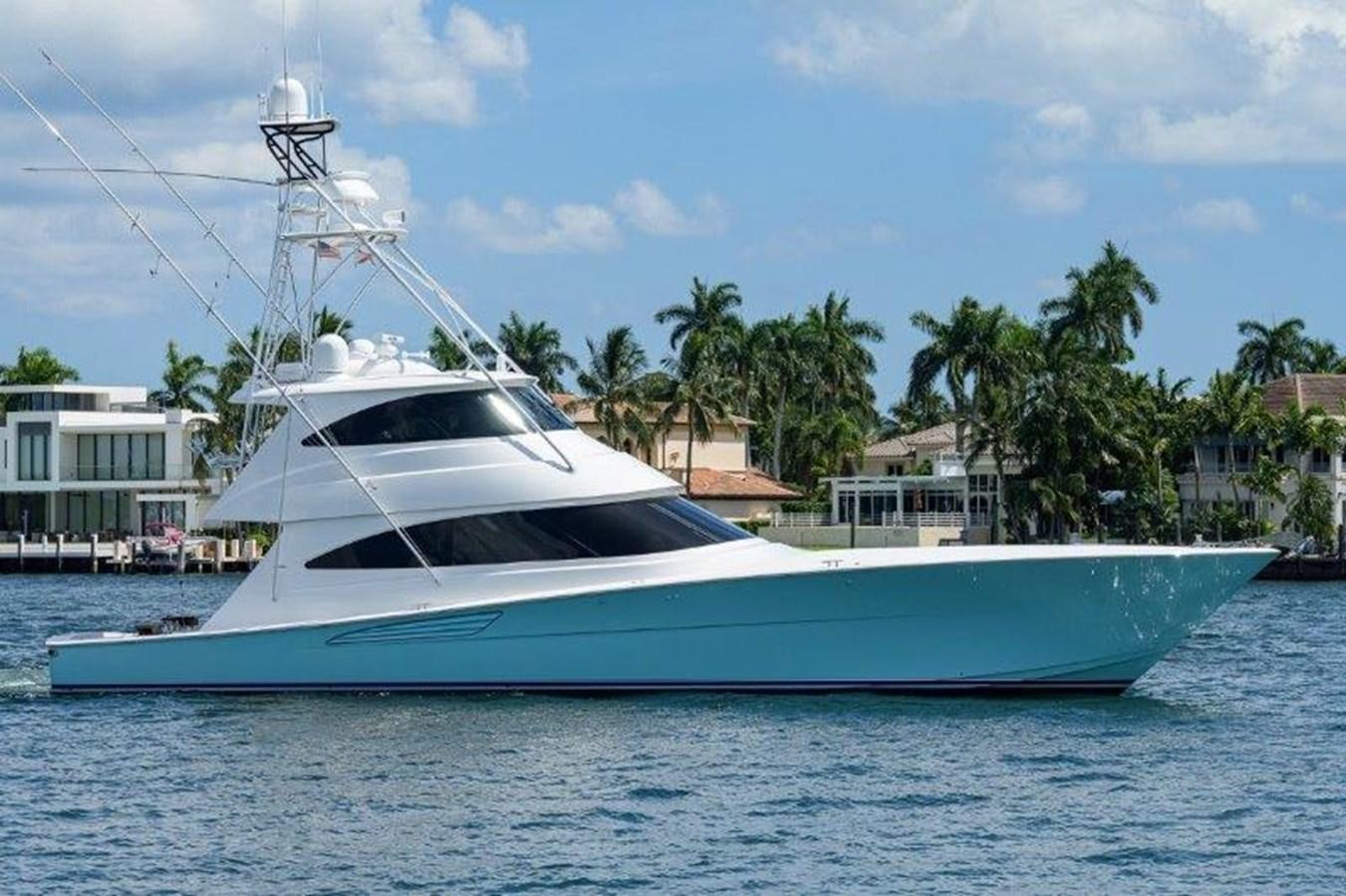 a white yacht in the water aboard 50 CALIBER Yacht for Sale