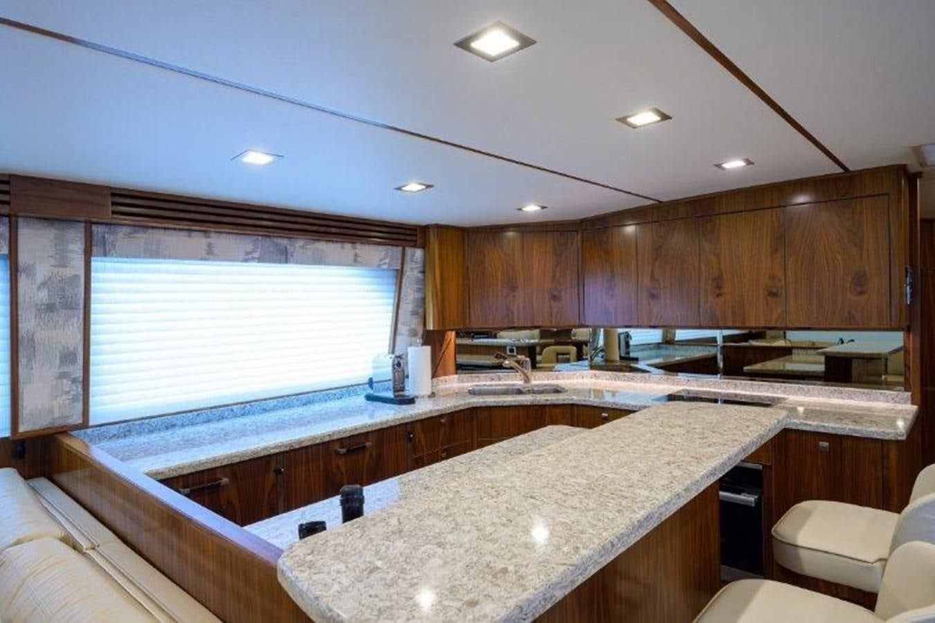 a kitchen with a large counter aboard 50 CALIBER Yacht for Sale