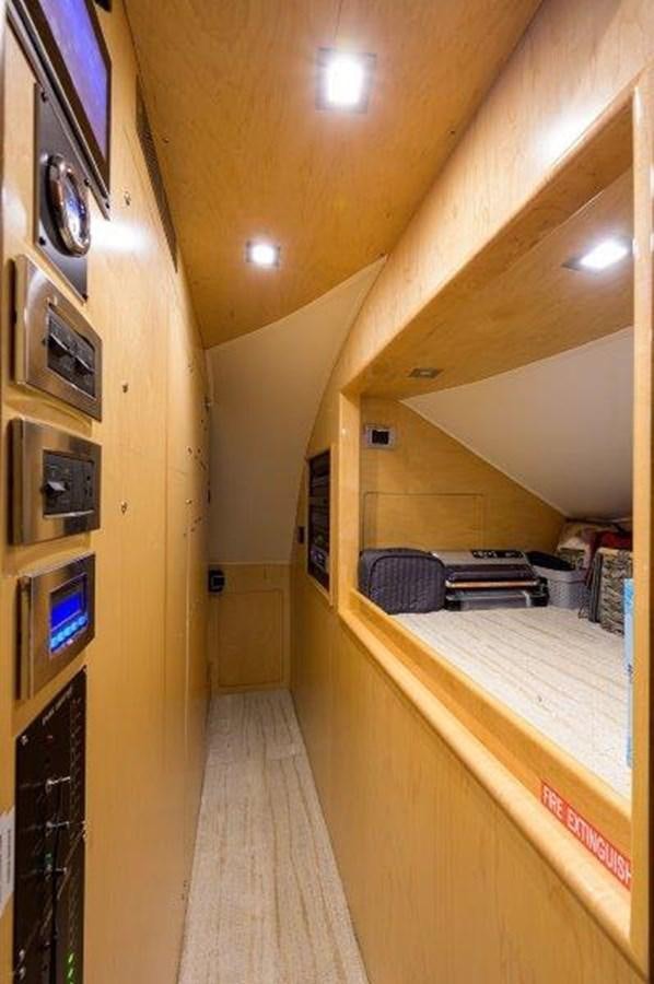 a hallway with a large window aboard 50 CALIBER Yacht for Sale