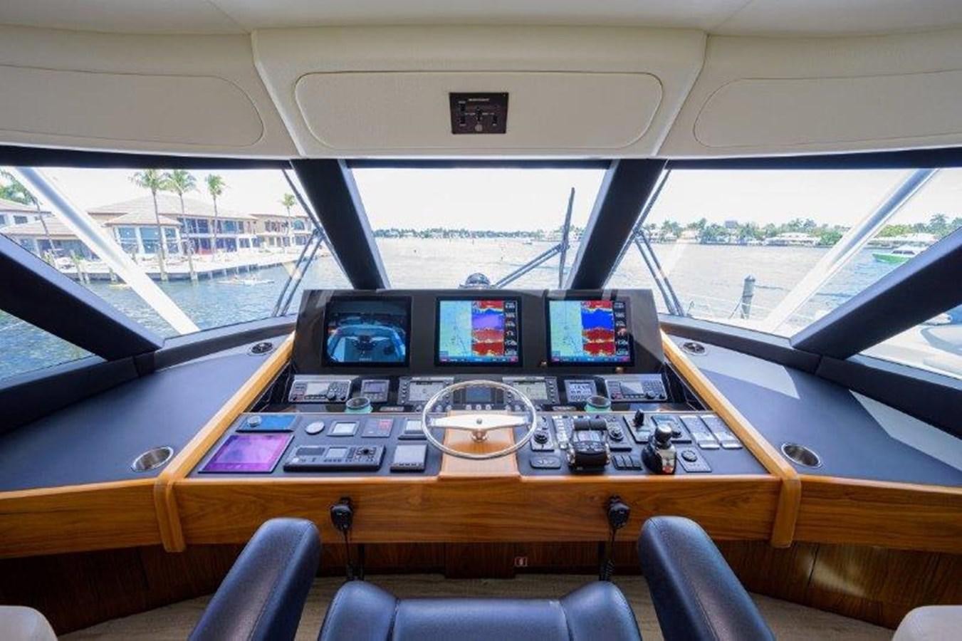 inside of a car aboard 50 CALIBER Yacht for Sale