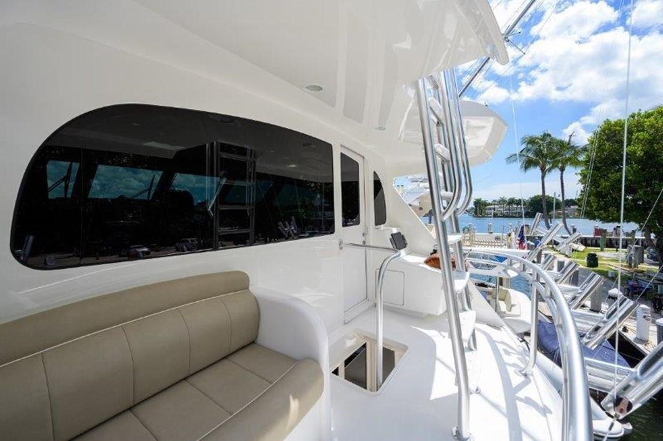 a boat with a window aboard 50 CALIBER Yacht for Sale