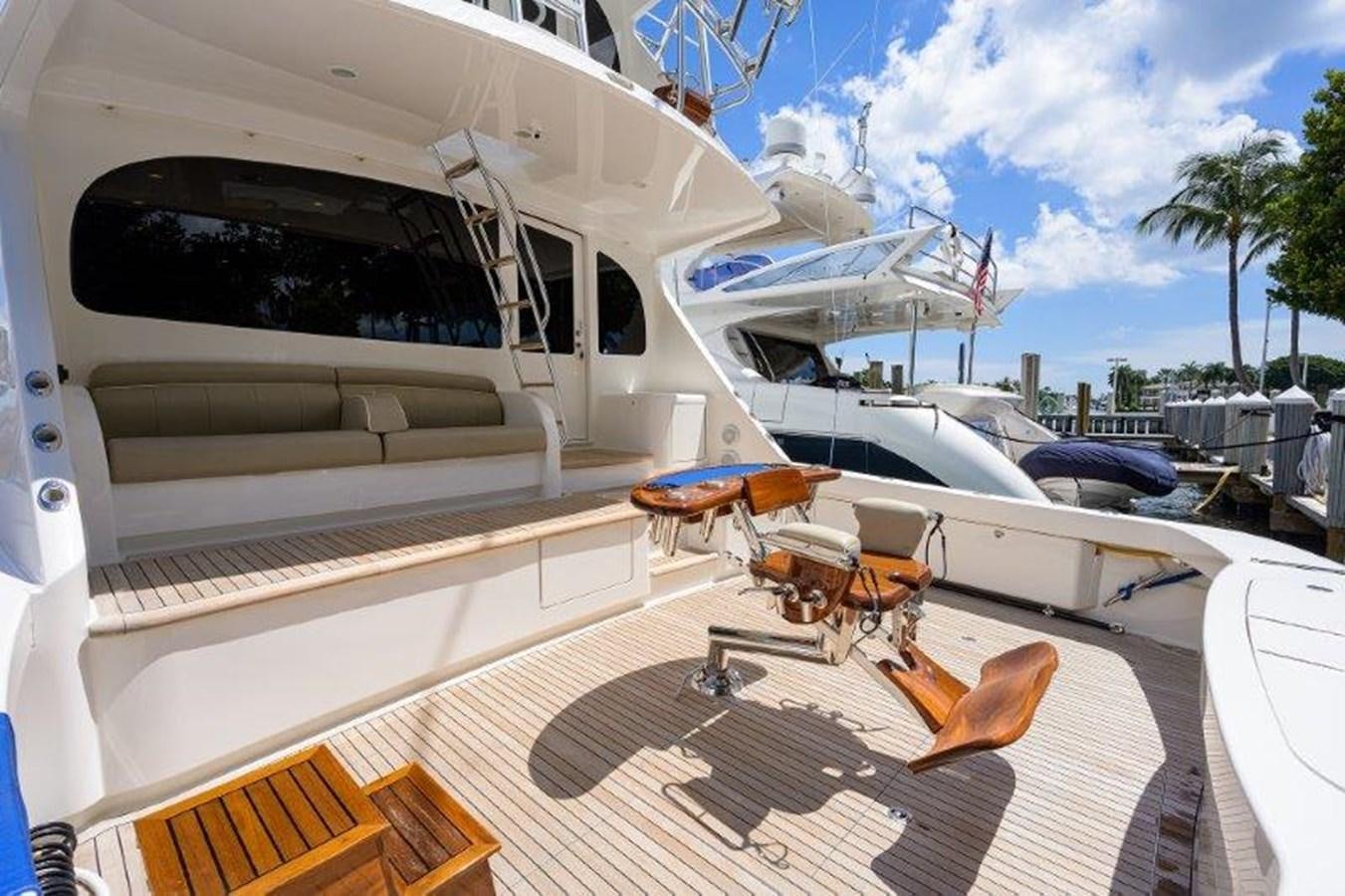 a boat docked at a pier aboard 50 CALIBER Yacht for Sale