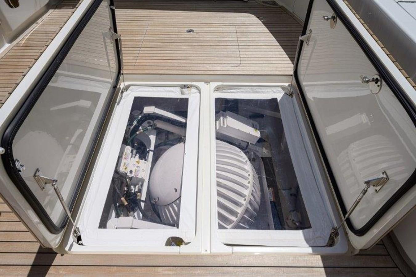 a couple of windows with a broken screen aboard 50 CALIBER Yacht for Sale
