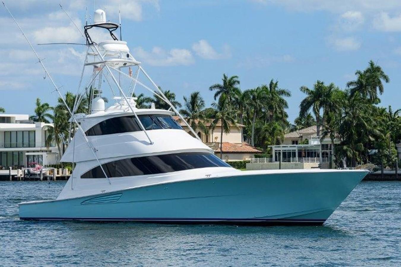 a white yacht on the water aboard 50 CALIBER Yacht for Sale