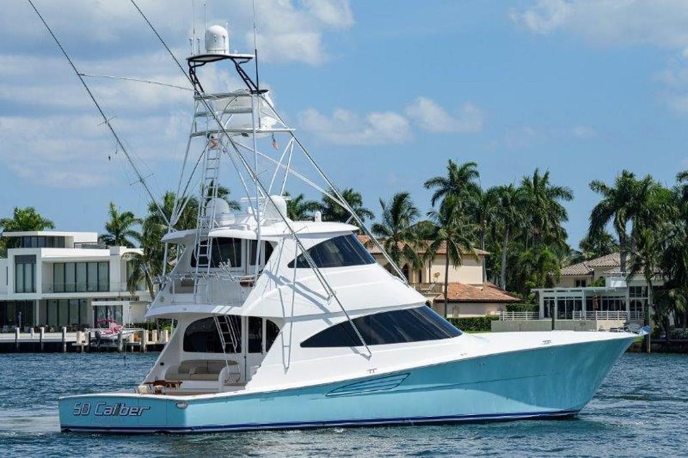 a boat in the water aboard 50 CALIBER Yacht for Sale