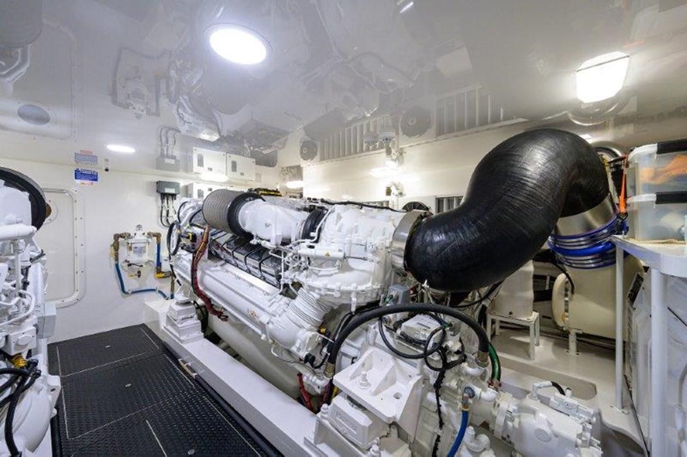 a large machine with a large metal object on top aboard 50 CALIBER Yacht for Sale